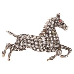 Antique Victorian silver and 9kt gold plated back, horse brooch with rose cut diamonds