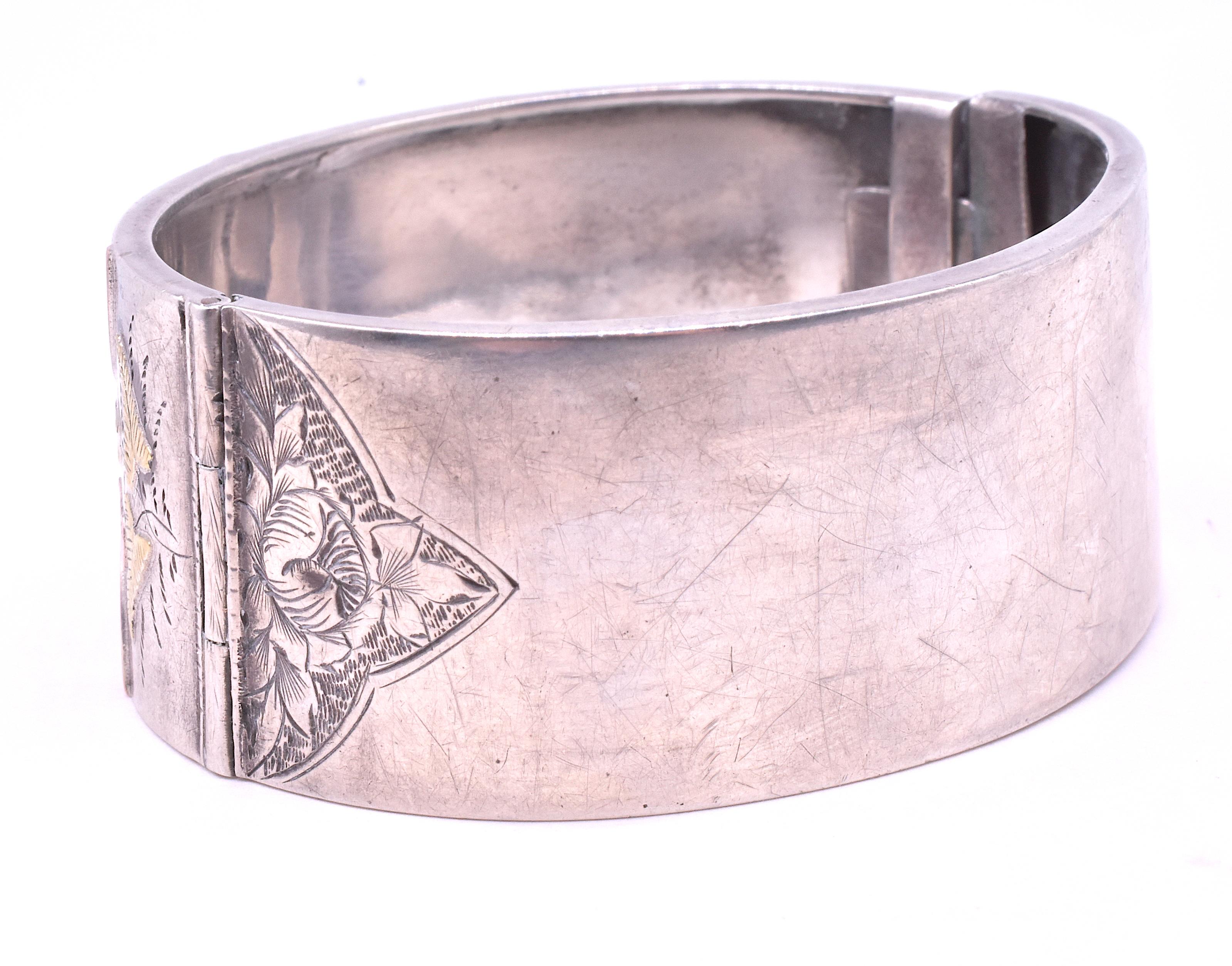 Victorian Silver and Gold Bangle with Roses, Leaves, and Lillies, circa 1880 In Good Condition For Sale In Baltimore, MD