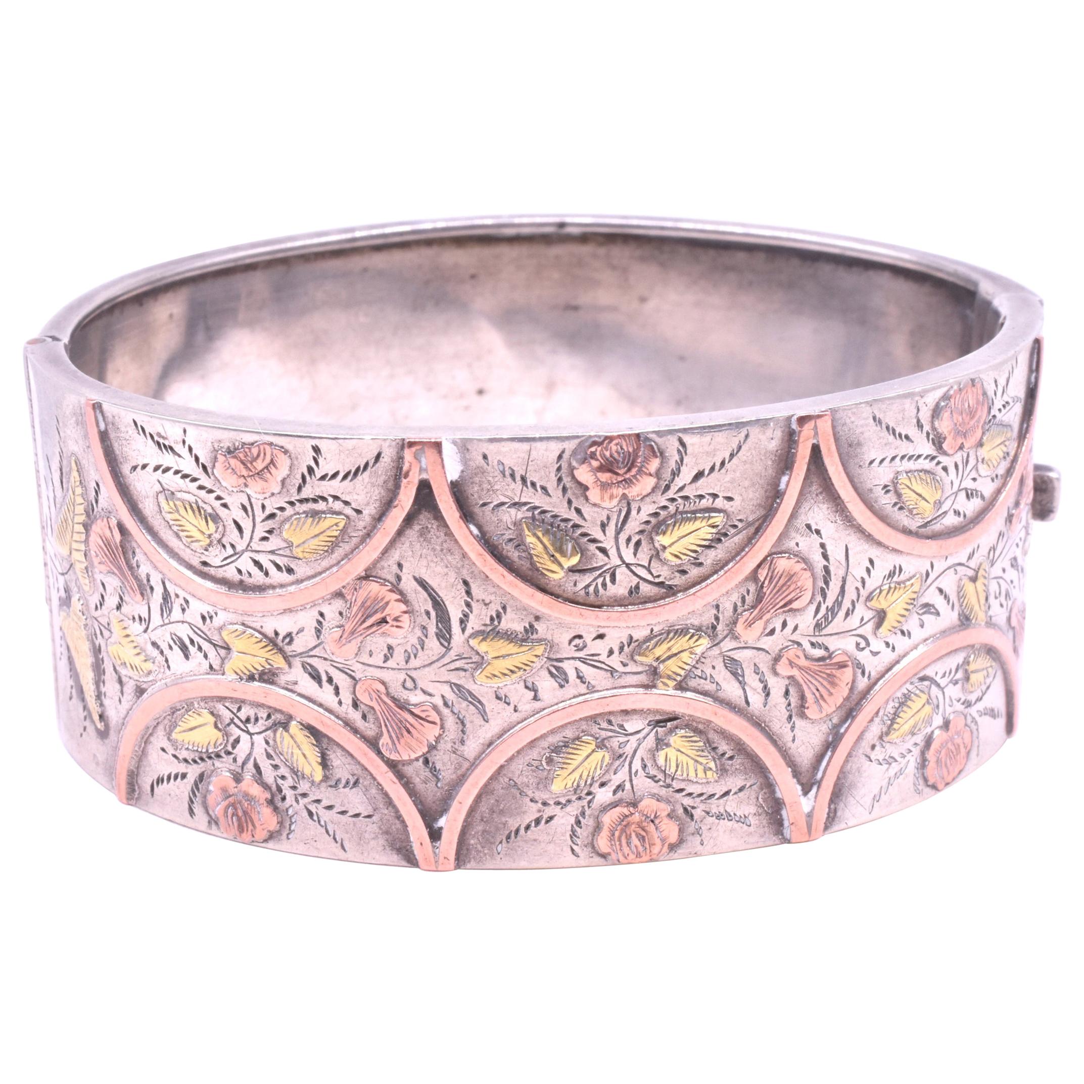 Victorian Silver and Gold Bangle with Roses, Leaves, and Lillies, circa 1880 For Sale