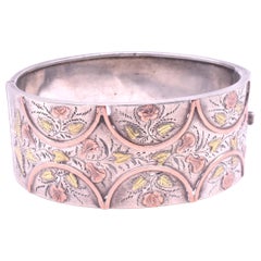 Victorian Silver and Gold Bangle with Roses, Leaves, and Lillies, circa 1880