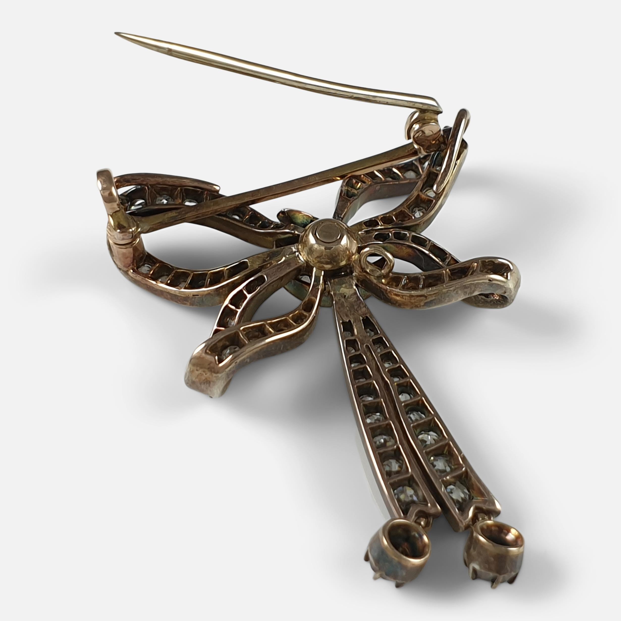 Old Mine Cut Victorian Silver and Gold Diamond Bow Brooch, circa 1890s For Sale