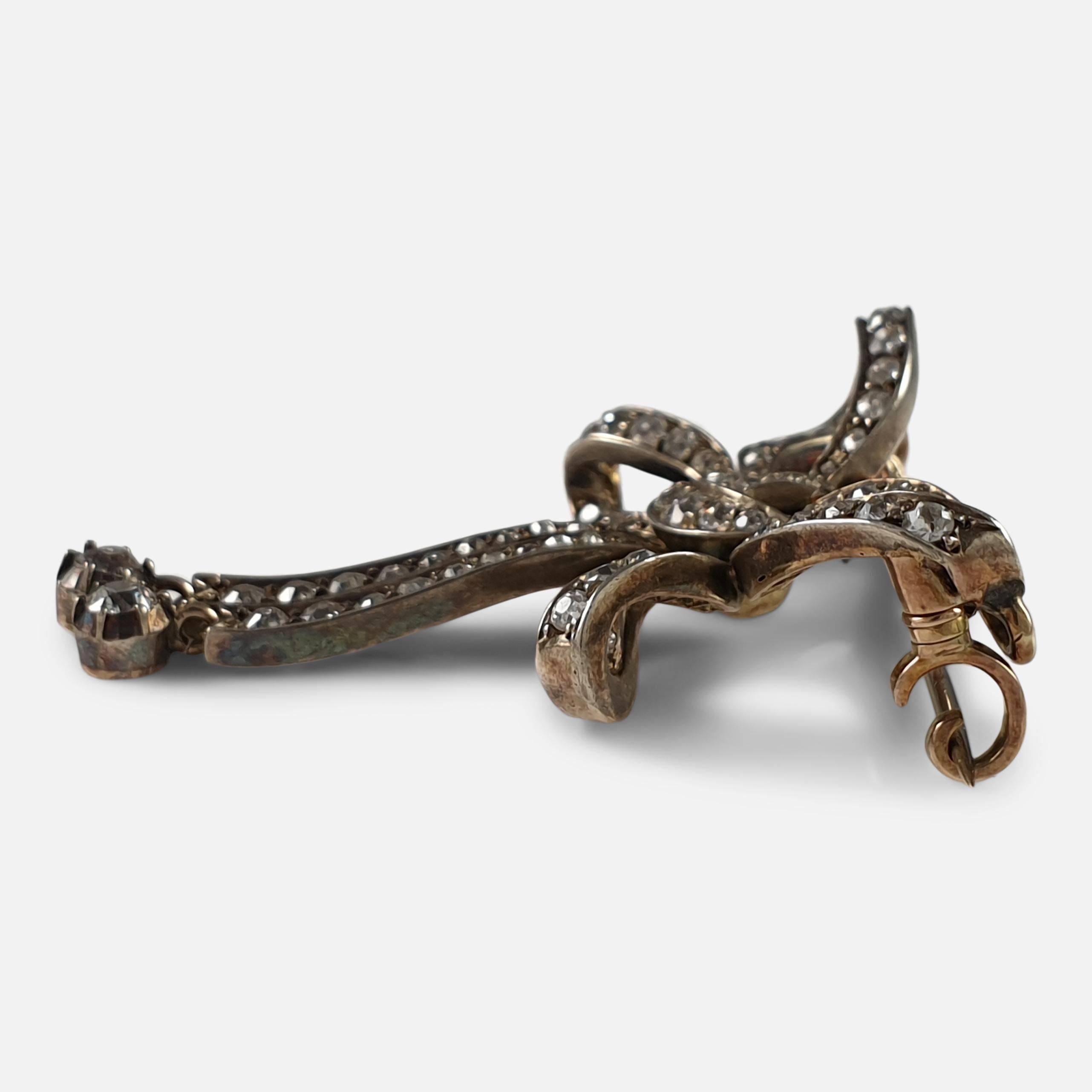 Victorian Silver and Gold Diamond Bow Brooch In Good Condition For Sale In Glasgow, GB