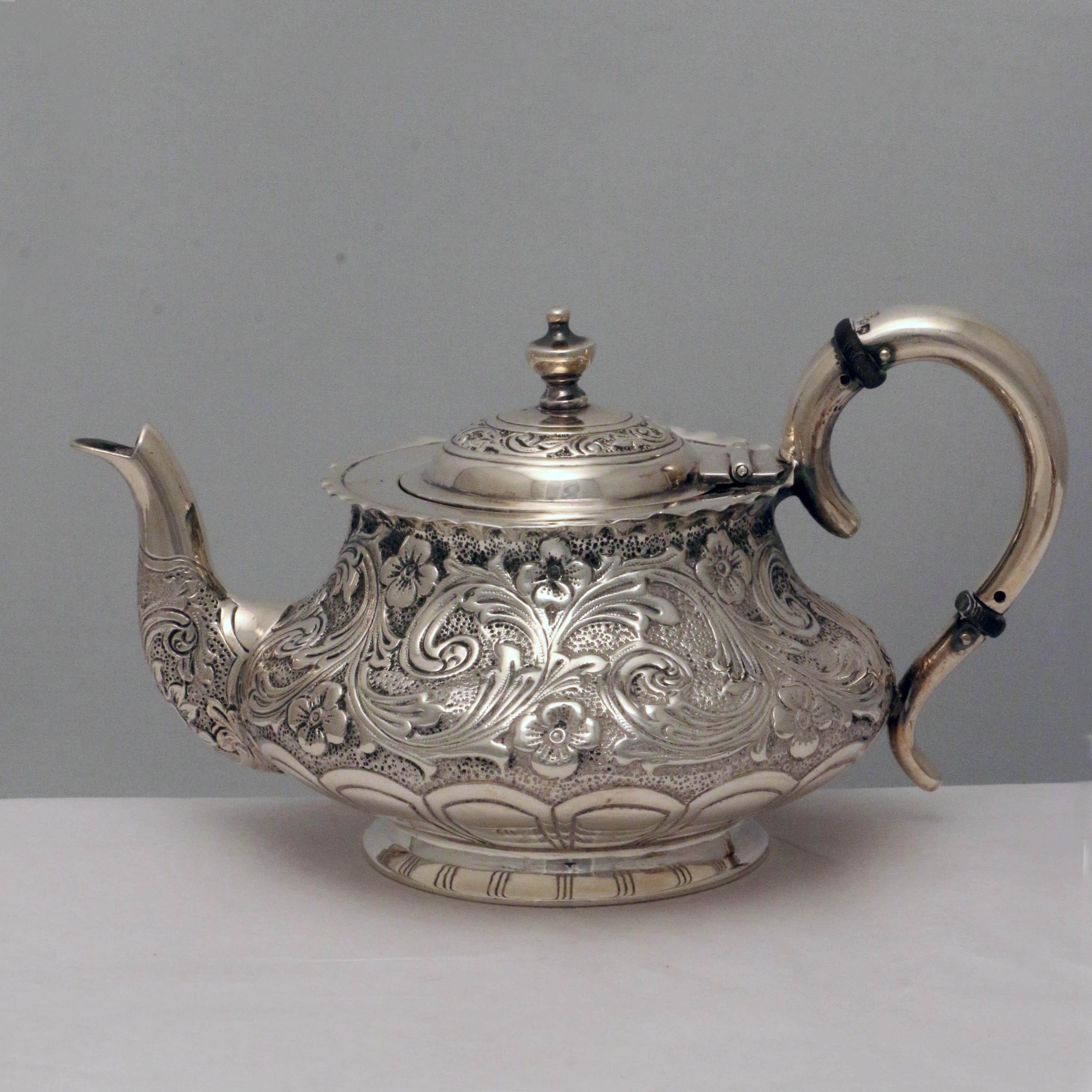 This charming set would be ideal for a single discriminating tea drinker. It comprises: the teapot, the sugar basin and matching milk jug. Though small, it has a wonderful feeling of skillful quality. Hall Marked Silver London 1887 by Wakely and