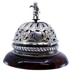 Victorian silver bell with garlands, ropes 
angel on tortoiseshell base