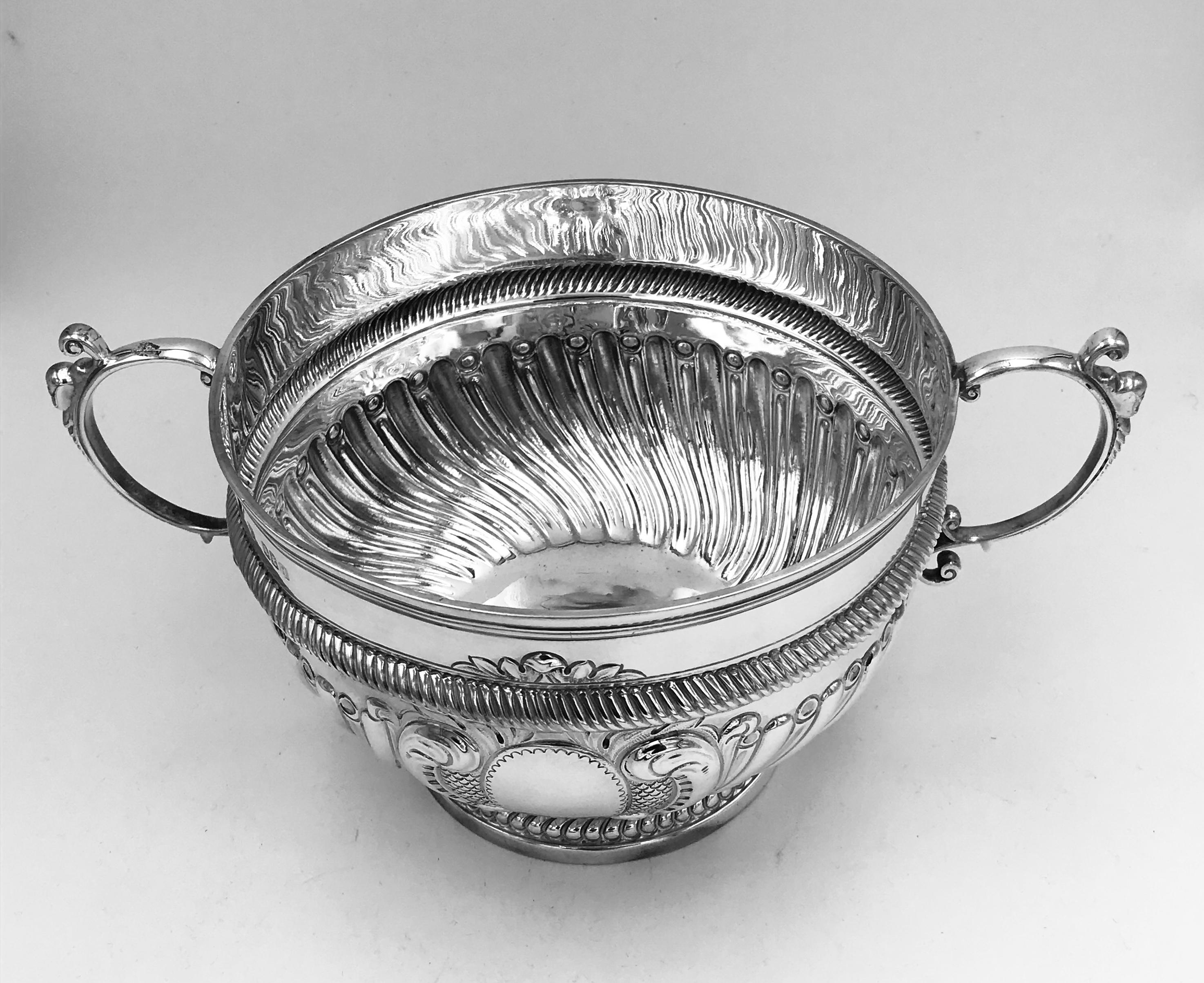 Victorian silver 2 handled bowl with fluted decoration.
This lovely silver bowl was made in London, 1899.
Britannia standard silver (95.8% pure) often used for special commissions.