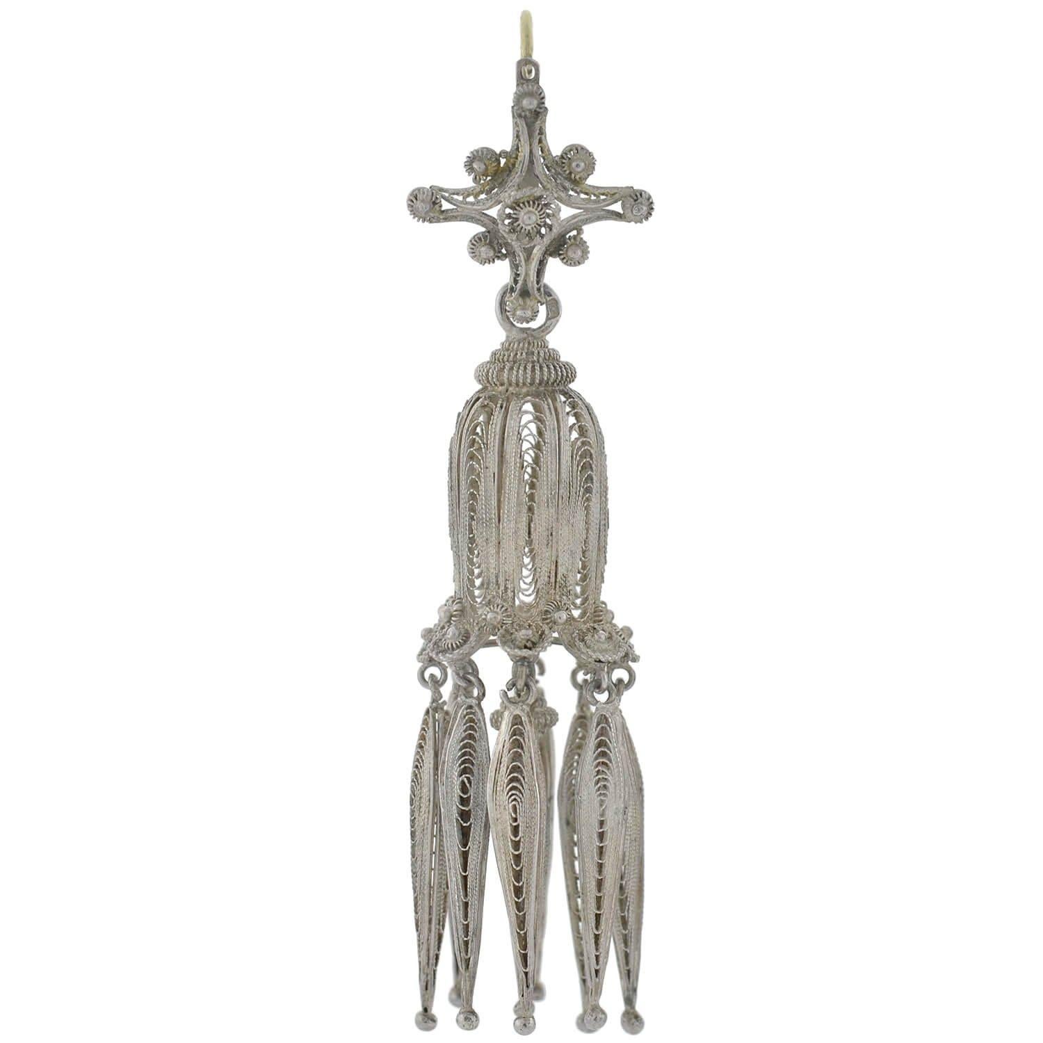 An incredibly elaborate and fantastic pair of cannetille earrings from the Victorian (ca1880) era! Crafted out of fine cannetille silver wirework, each earring features a detachable surmount, allowing them to be worn either as a simple 