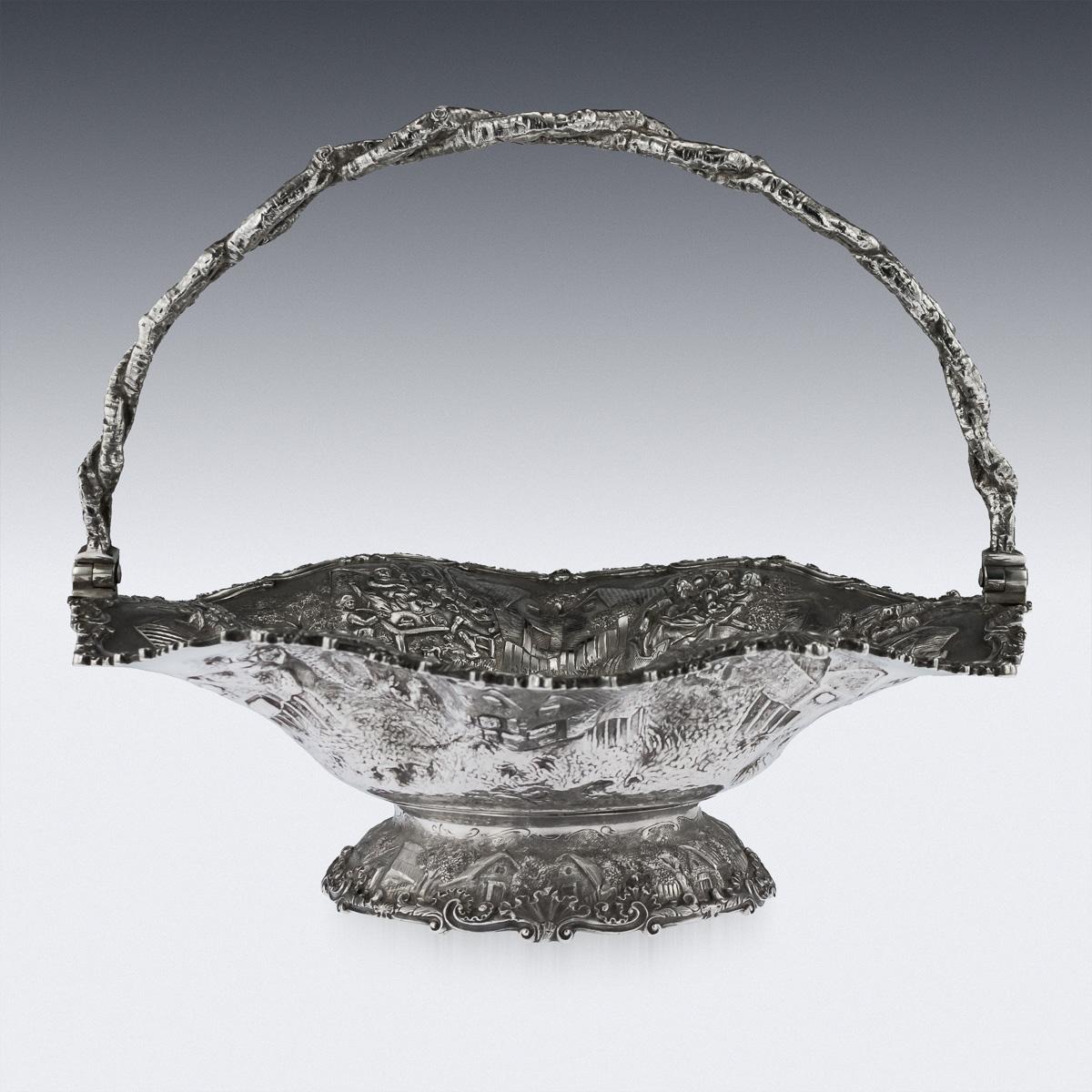 Antique 19th century Victorian extremely rare solid silver fruit basket, made in the 'Teniers' style, (a renowned Dutch painter), basket decorated with a rural landscape and scenes of peasants drinking, the domed base with rural scenes, edges