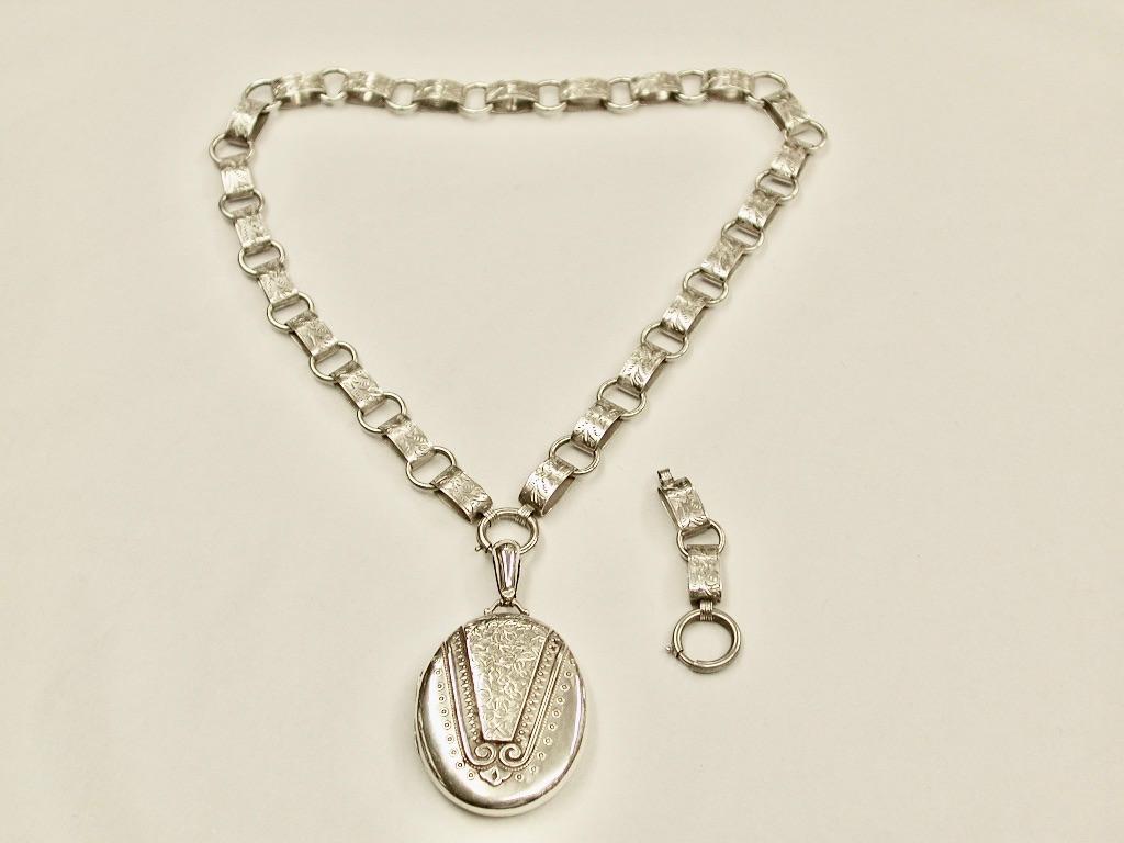 Victorian Silver Locket & Collar, Dated 1883,Birmingham
Beautiful locket and collar which can be worn at 2 lengths.
The 2 extension links and ring make it 2 inches lower.
The locket is hallmarked for 1883 in Birmingham,with the sterling silver