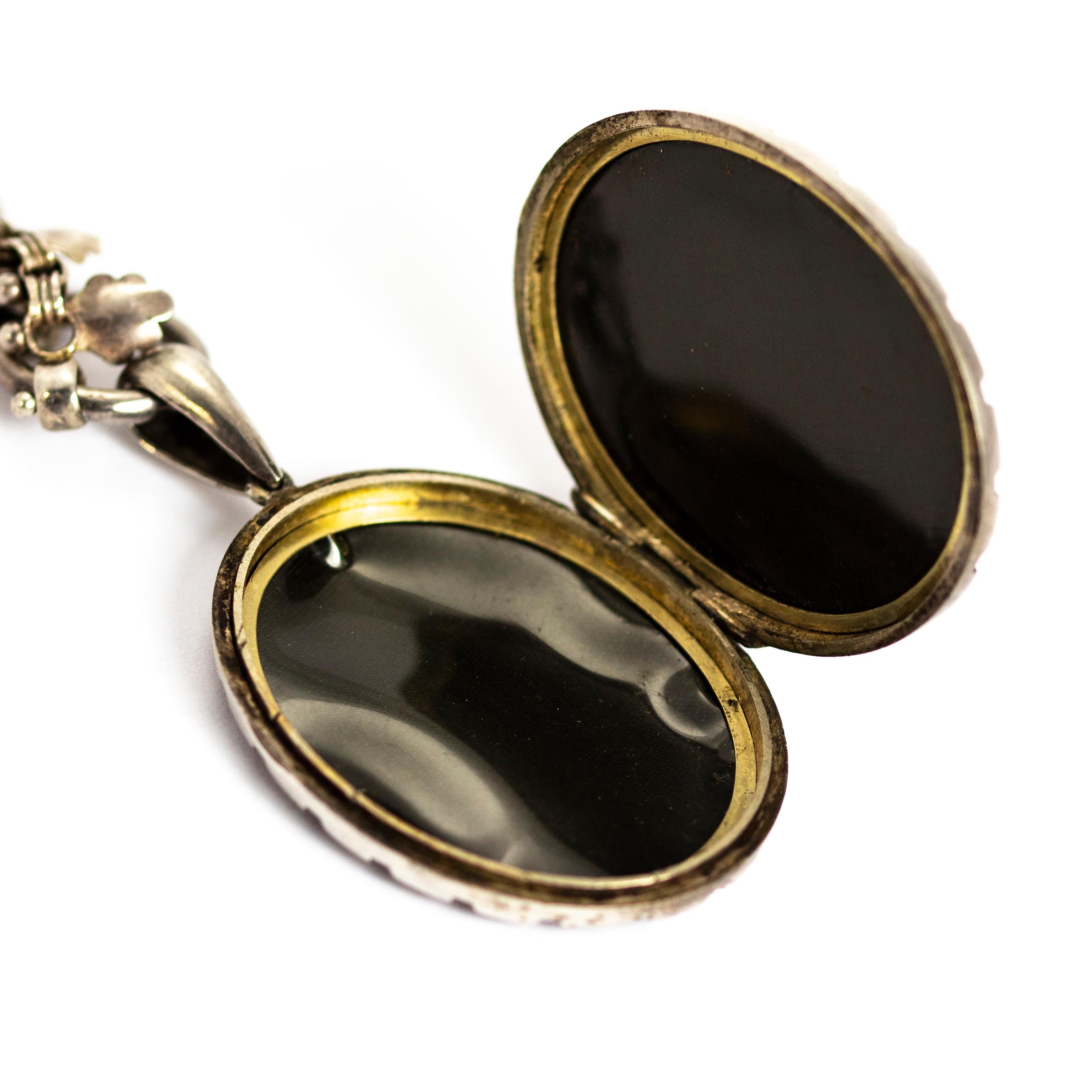 Victorian Silver Locket with Bird and Floral Detail 4