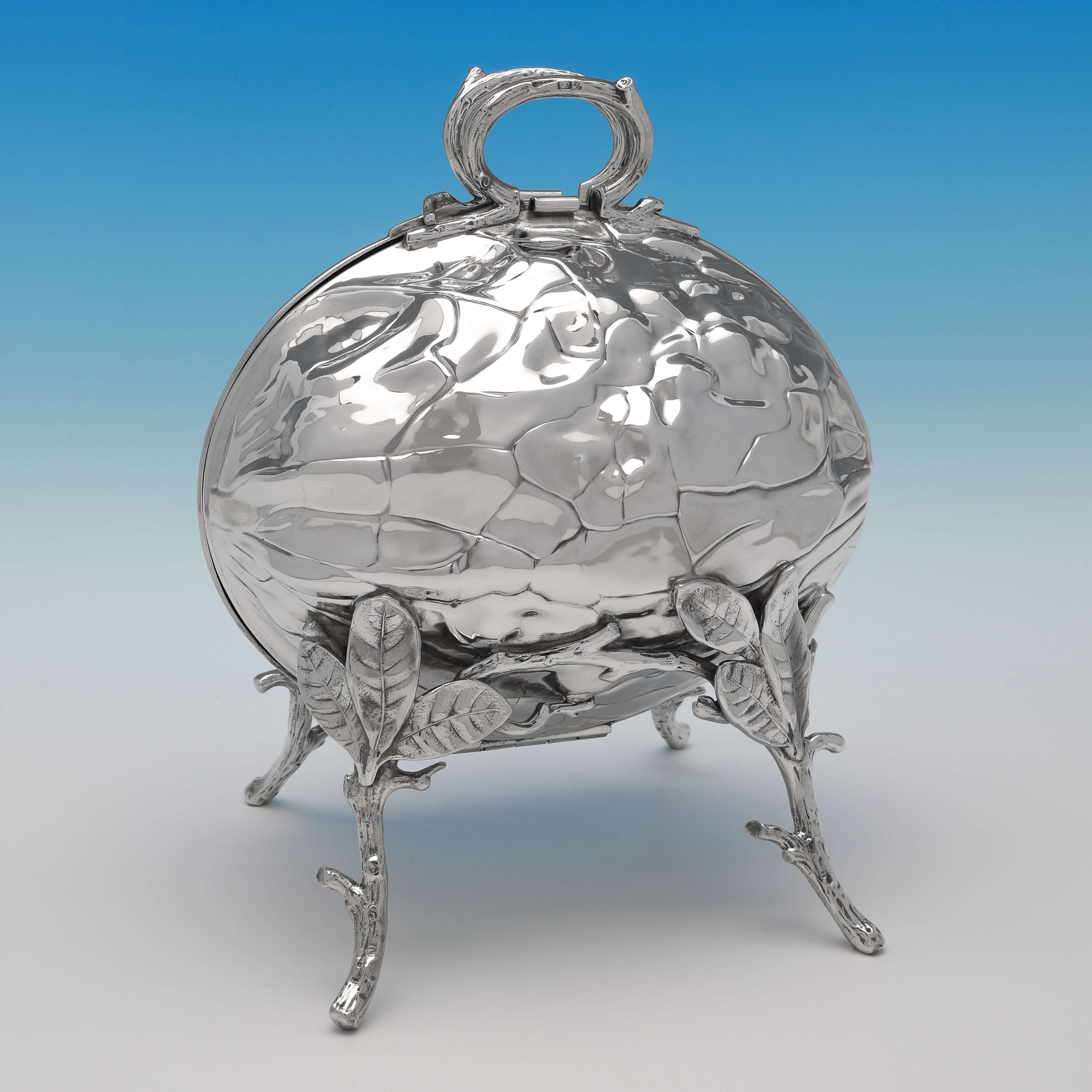 Made circa 1880, this stylish, Novelty, antique silver plated folding biscuit box, is modelled to look like a walnut. The biscuit box measures 9.5