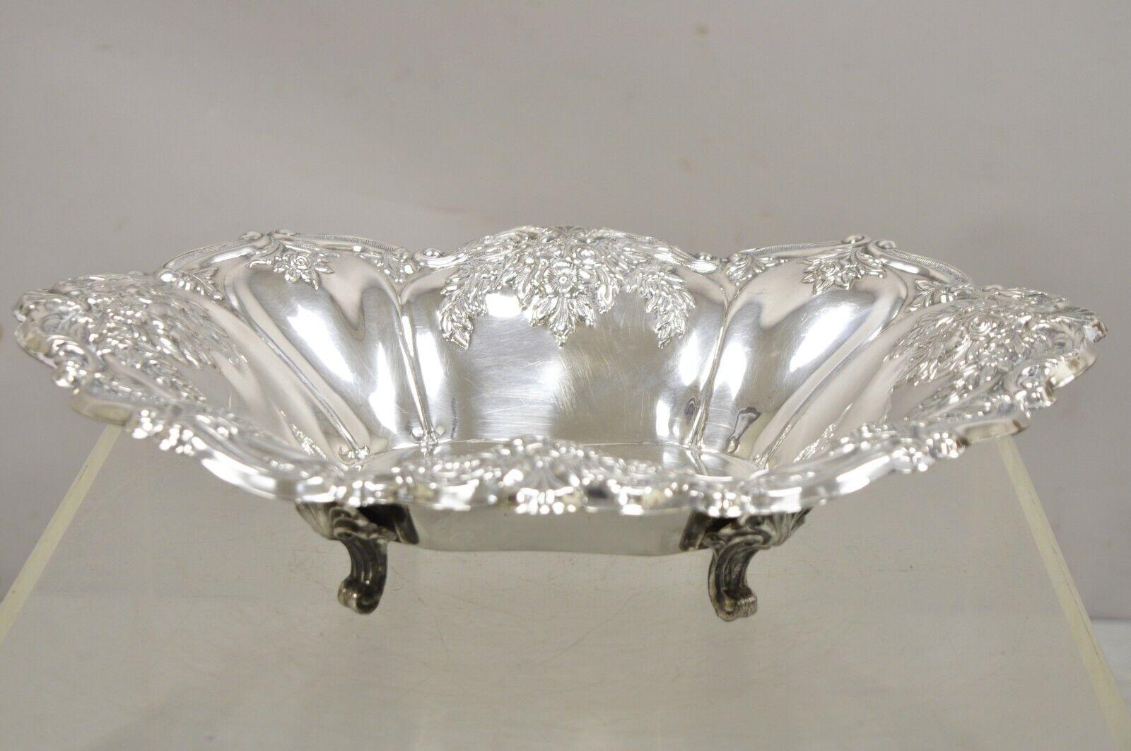 Antique Victorian silver plated floral repousse trinket dish serving bowl platter. Item feature a shapely form, leafy floral repousse throughout, raised on small ornate feet, original label, very nice antique item, quality craftsmanship, great style