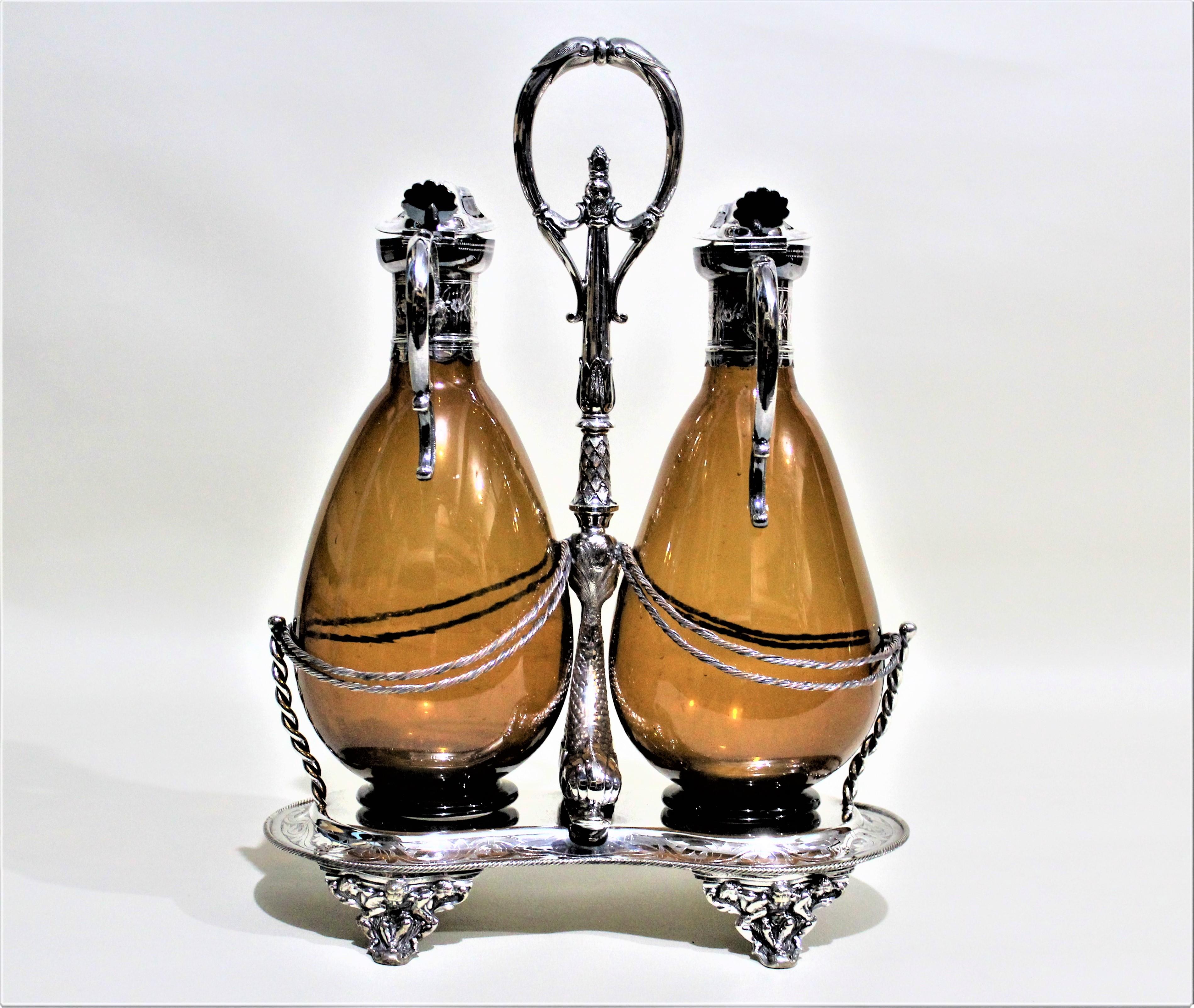 English Victorian Silver Plated Tantalus or Sherry Stand with Amber Glass Bottles
