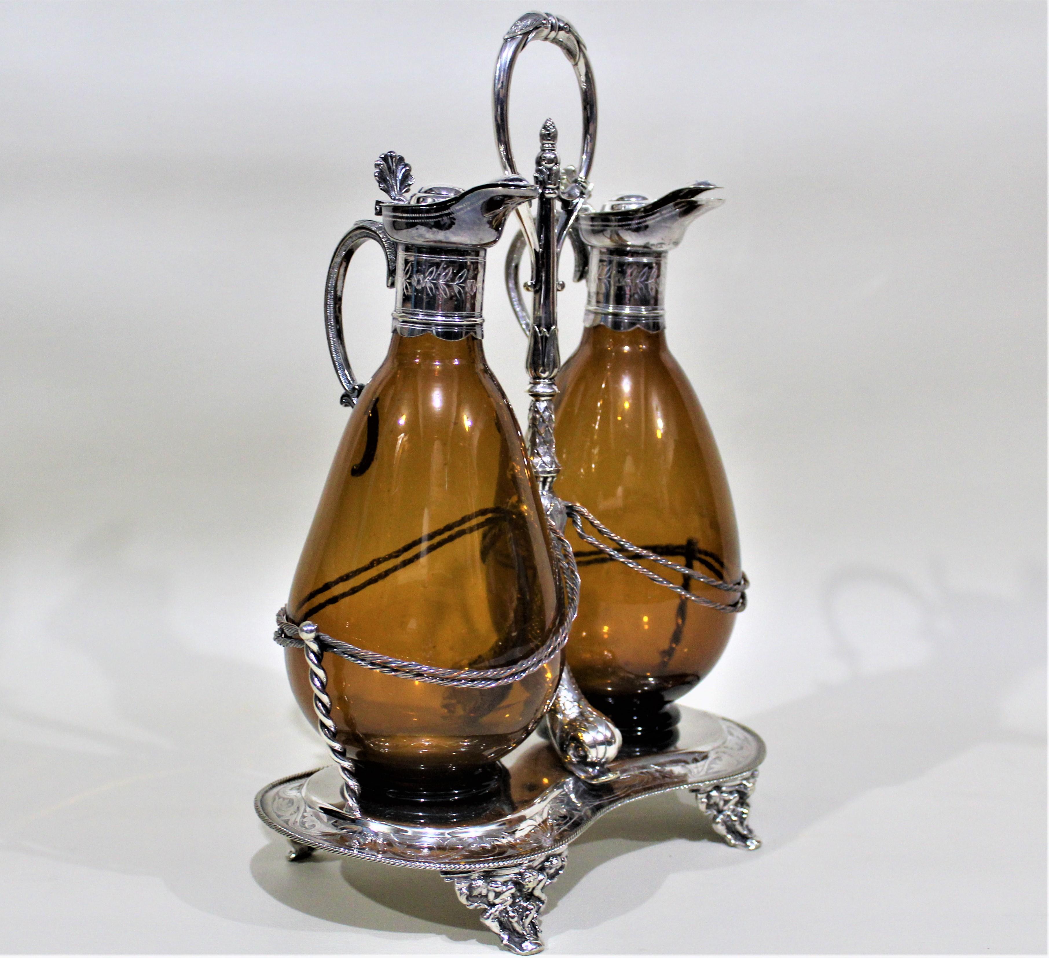 Victorian Silver Plated Tantalus or Sherry Stand with Amber Glass Bottles In Fair Condition In Hamilton, Ontario