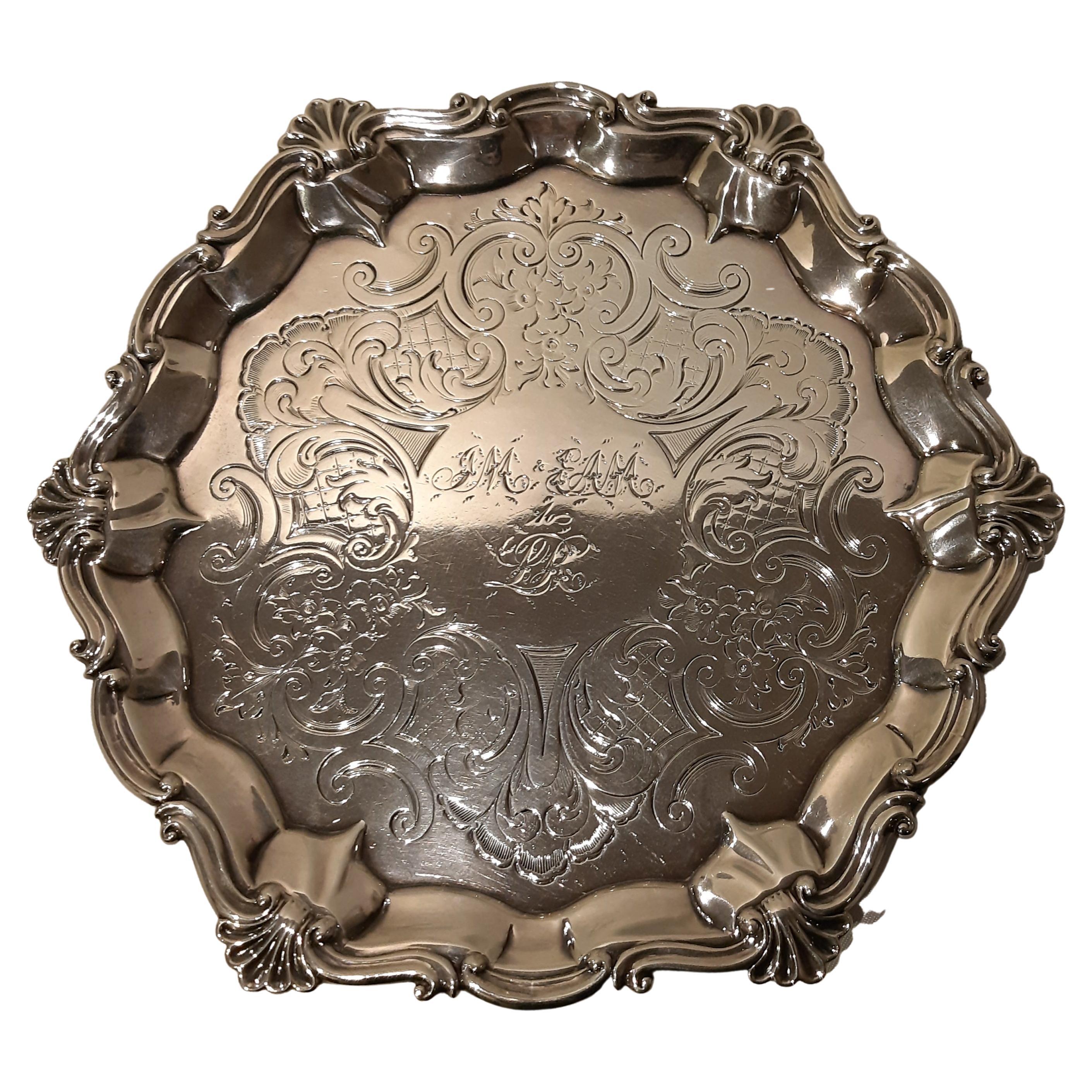 Victorian silver salver supported by feet with punches, London 1855 For Sale