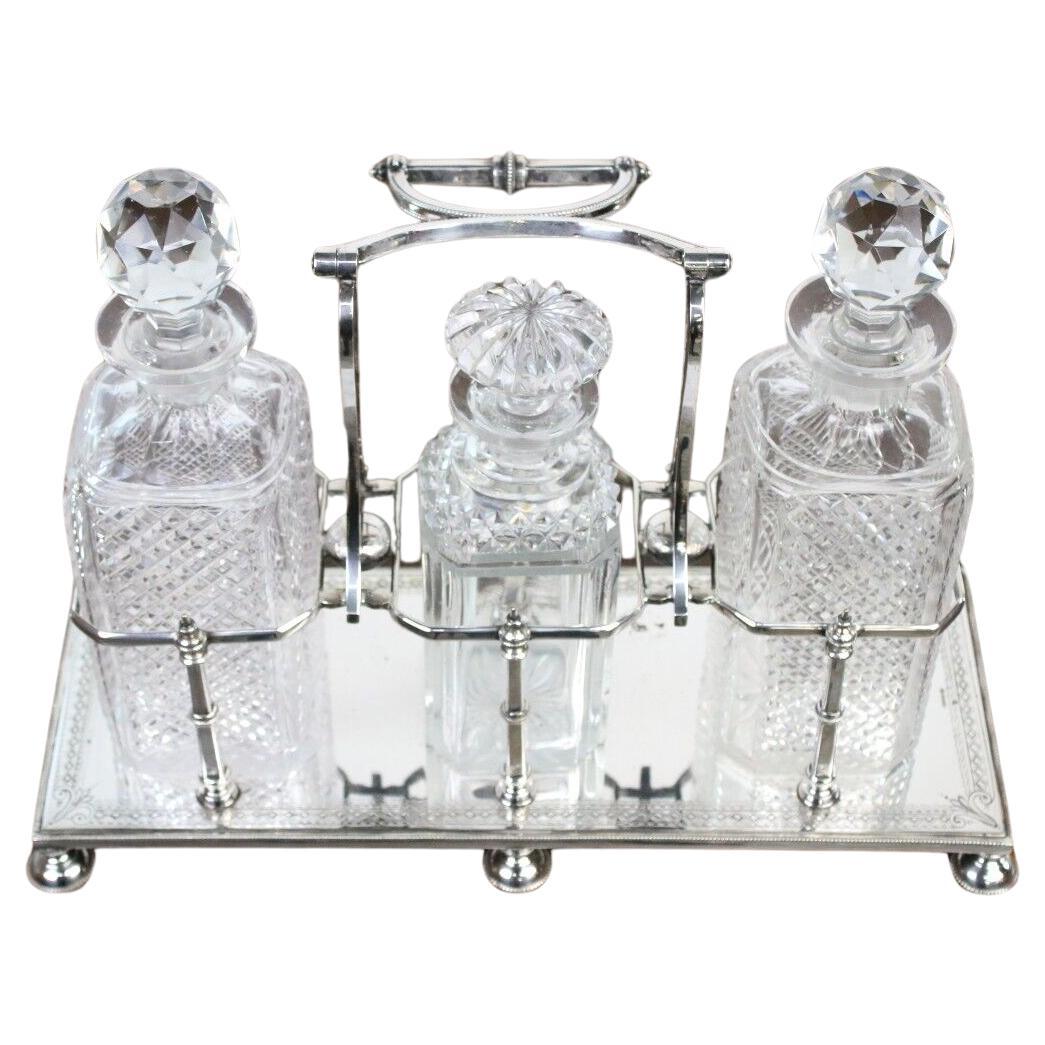 Victorian Silver Three Bottle Decanter Tantalus Set For Sale