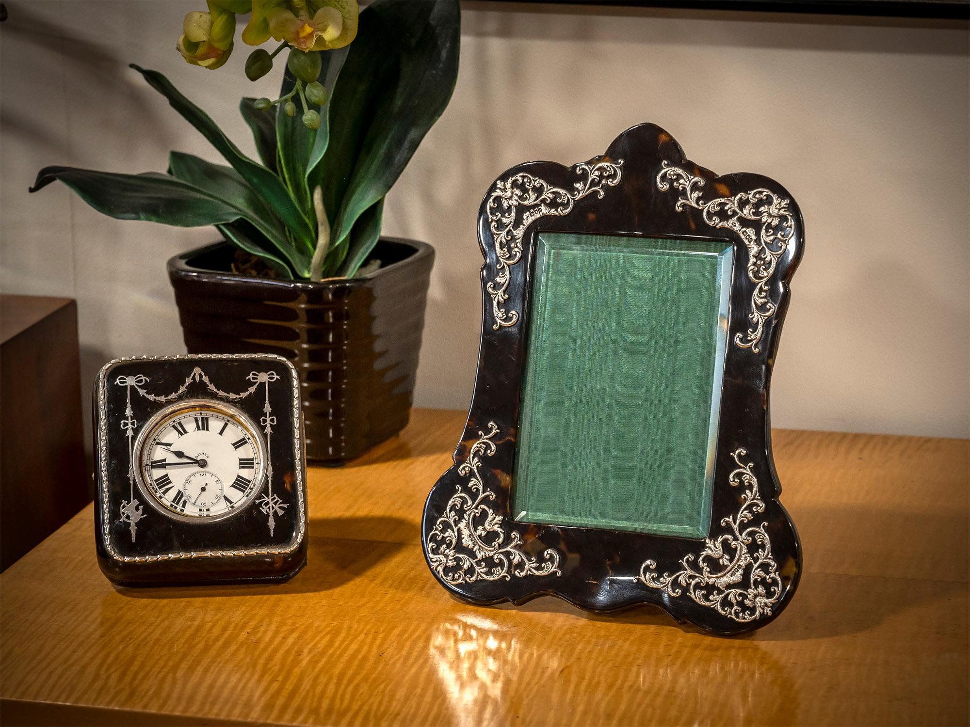 Mounted with Sterling Silver

From our Accessories collection, we are delighted to offer this Silver and Tortoiseshell Picture Frame. The Picture frame beautifully shaped rounded bulbous corners and domed finial top finished in Tortoiseshell. The