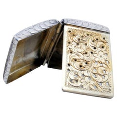 Victorian silver vinaigrette with relief lid 
gold interior