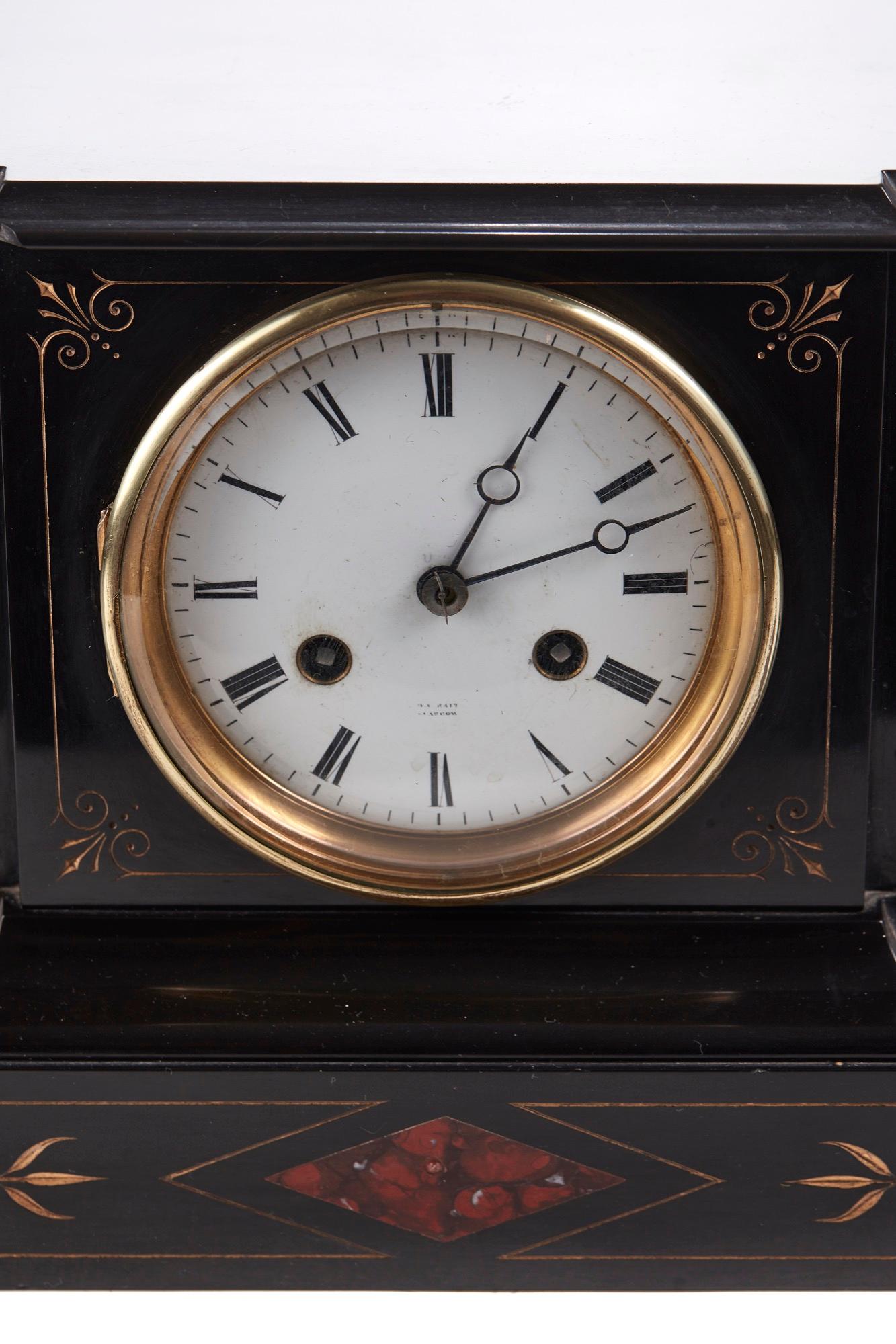 Victorian slate and rouge marble architectural mantel (fireplace) clock. The substantial case inset with rouge marble panels enclosing the 10cm enameled dial painted with Roman numerals and indistinctly signed 'Glasgow', the clock with a two train