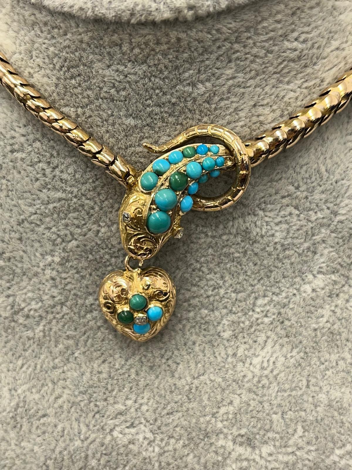 An absolutely stunning Victorian-era snake necklace, set with vibrant turquoise and 3 sparkling diamonds.
Expertly fashioned from solid 15ct gold (tested), 
this exquisite piece features classic Victorian craftsmanship and symbolism. In wonderful