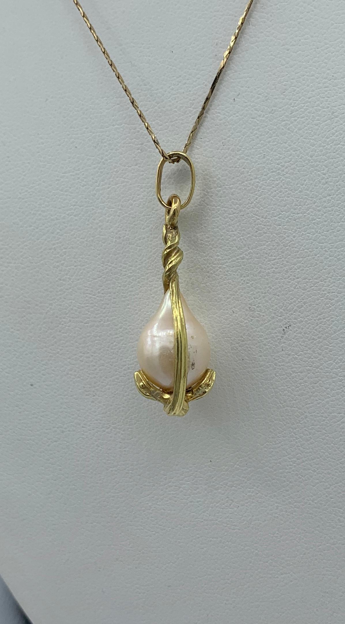 Women's or Men's Victorian Snake Pendant Necklace Baroque Pearl Egg Globe Antique 14 Karat Gold For Sale