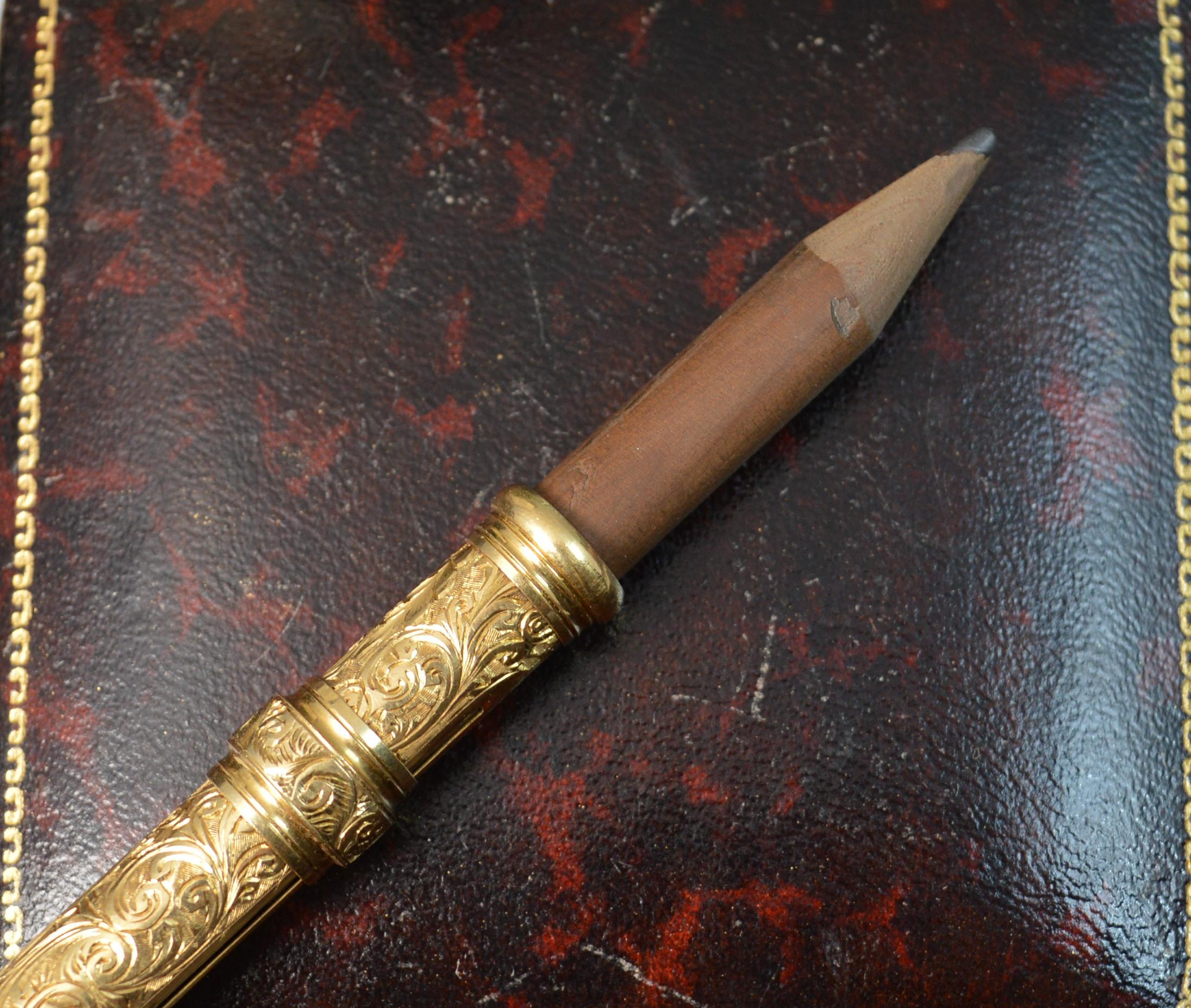 gold propelling pencil