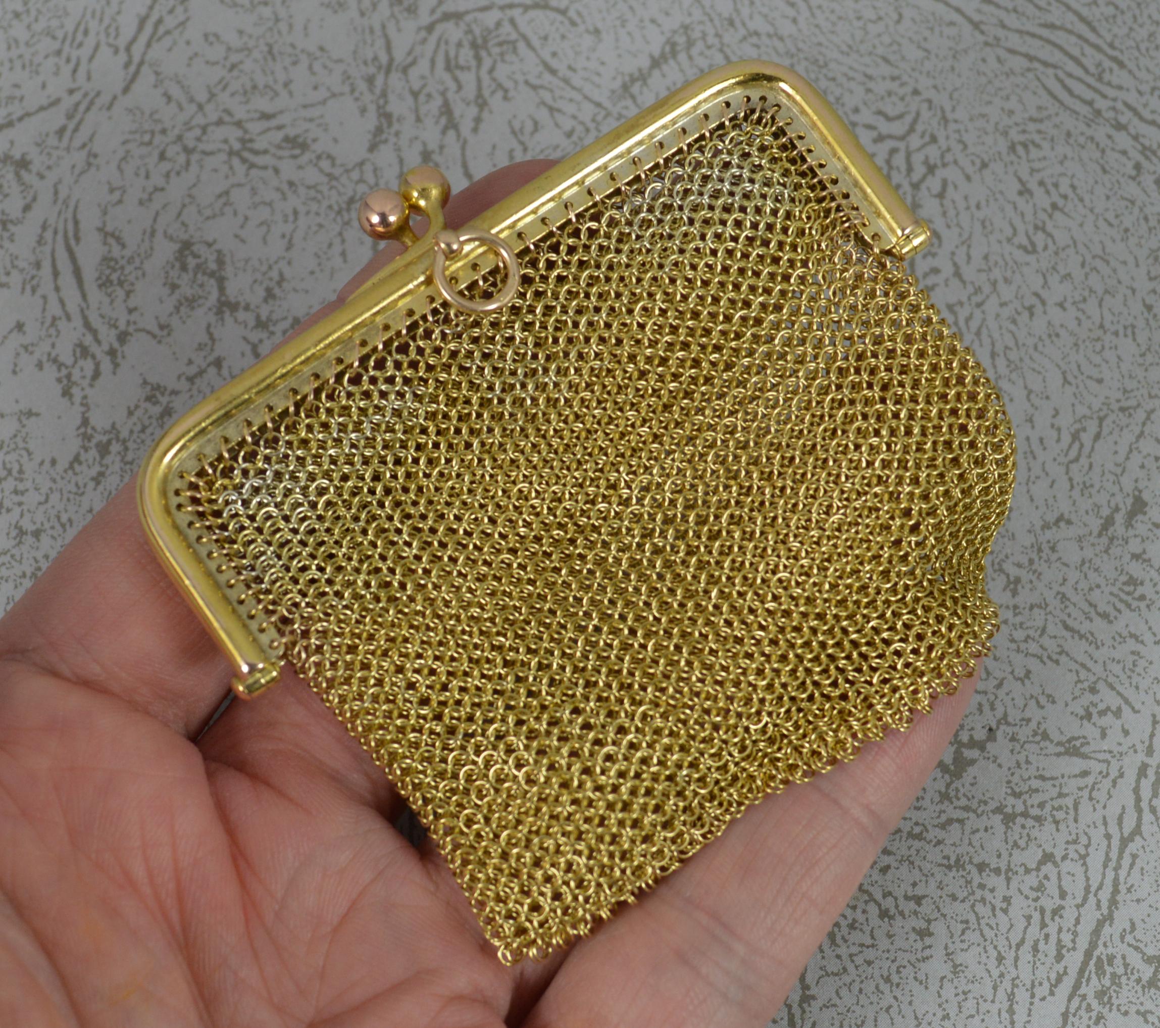 A very fine antique 9ct gold chain mail purse.
Well made example in solid 9 carat gold.
A chain mail link with plain top and two ball clasp with ball drops.

Hallmarks ; 9ct quite worn
Weight ; 31.6 grams
Size ; 74mm x 70mm including top