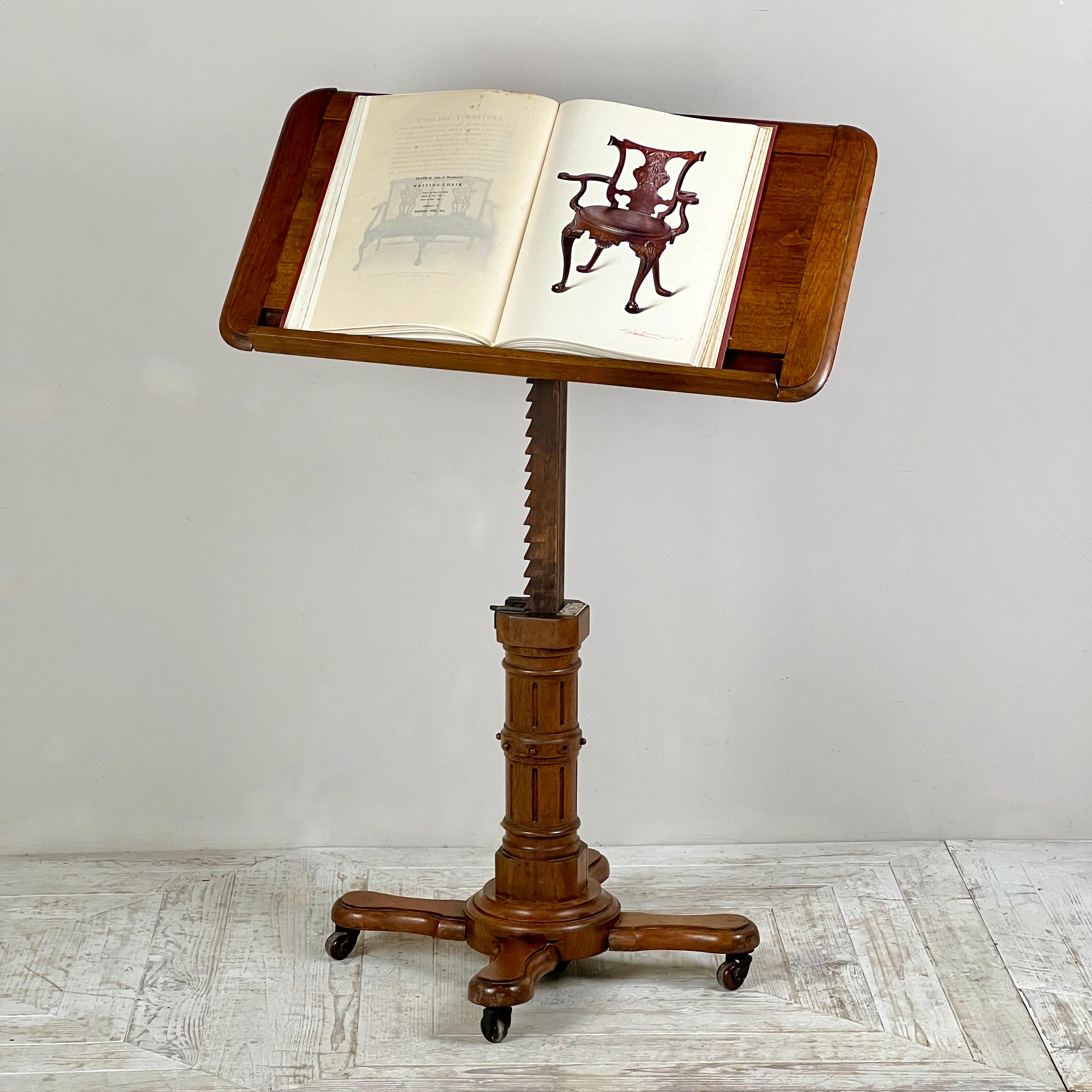 An extremely adaptable and functional Victorian solid oak adjustable reading table by John Carter, also known as the 