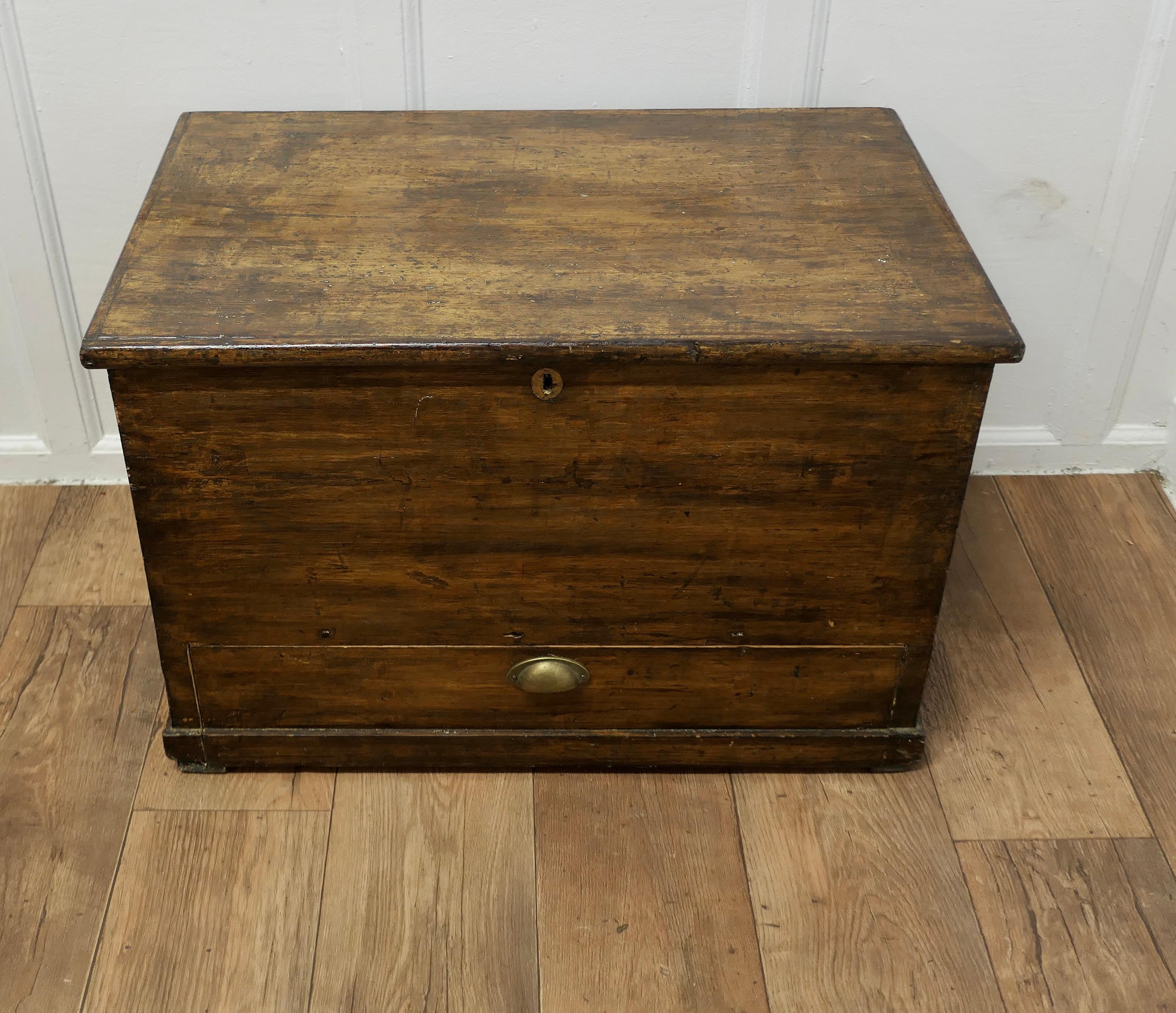  Victorian Solid Pine Mule Chest.

The Chest is a sturdy piece, it has a concealed drawer at the bottom
The top of the box has a moulded edge, and the interior has some of the original decorative lining paper still intact, the exterior is in its