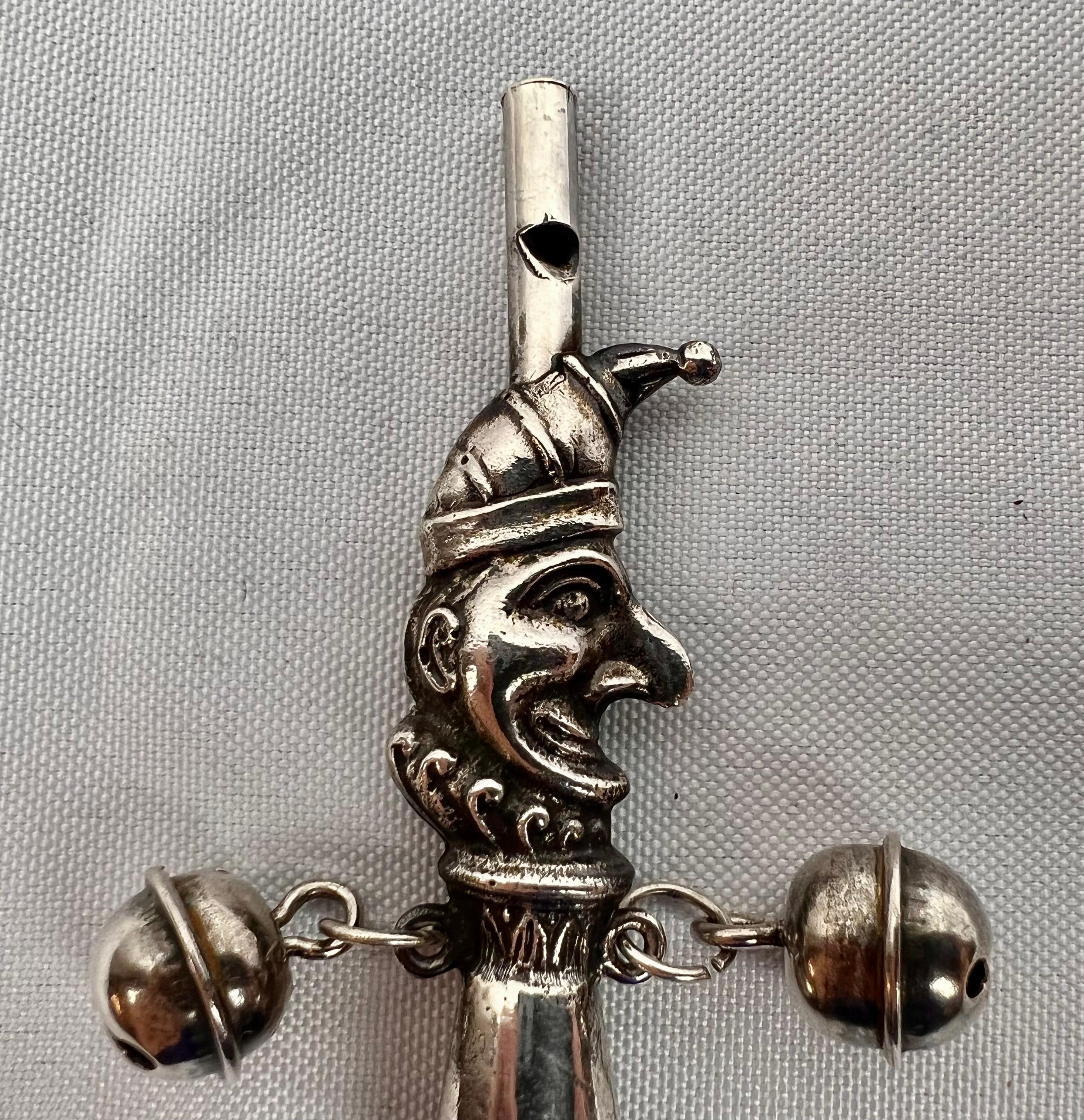 The Jester, a Victorian Solid Silver Form Baby Rattle with Ebony Turned Handle In Good Condition In West Palm Beach, FL