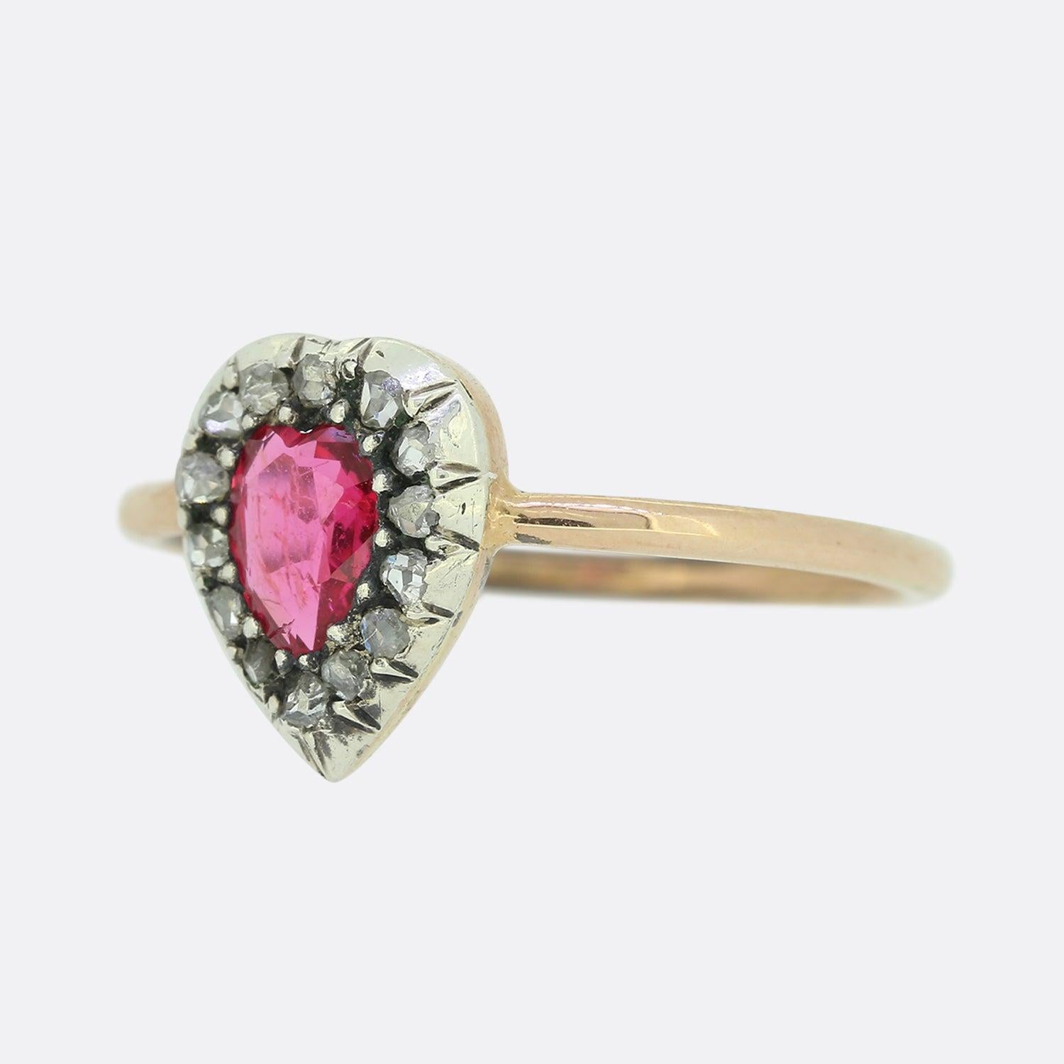 Here we have a fabulous spinel and diamond ring originally dating back to the Victorian era. This ring has been crafted in the shape of a single heart with a heart shaped spinel in the centre and surrounding rose cut diamonds set in silver. 

This