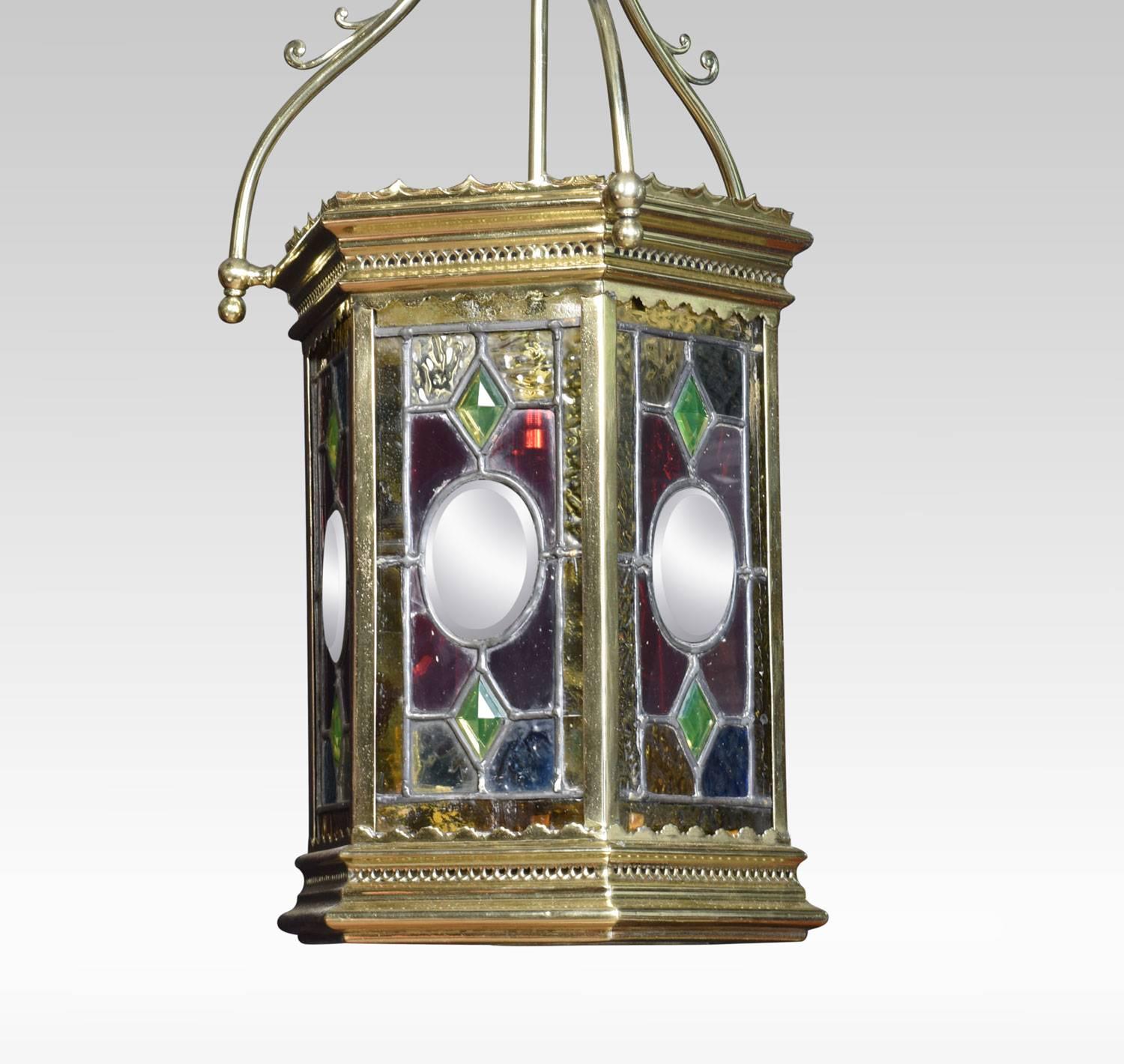 Late 19th century brass hexagonal hall lantern with stained and leaded glass panels. The lantern has been rewired.
Dimensions:
Height 30.5 inches
Width 10 inches
Depth 10 inches.
