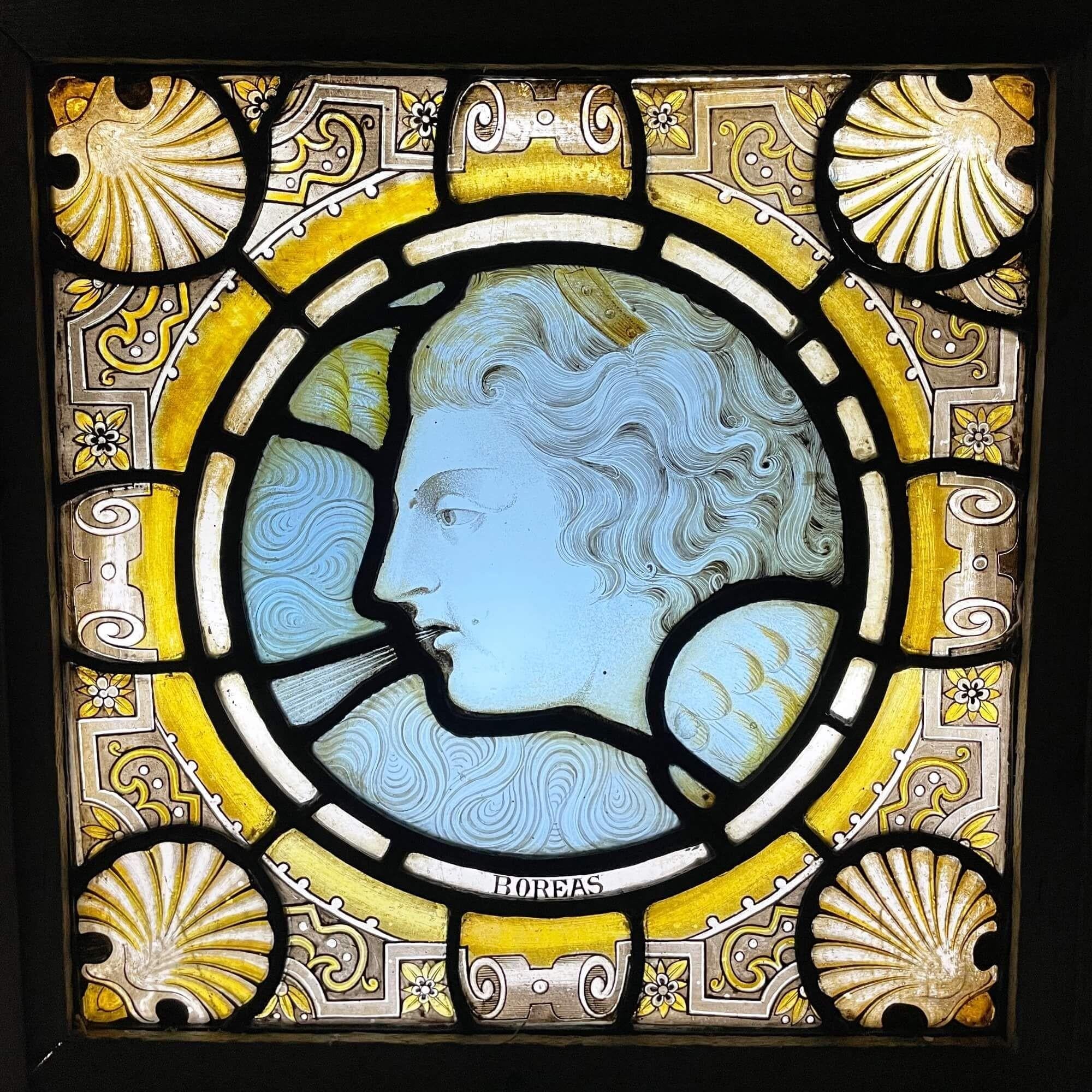 A late 19th century Victorian stained glass window panel depicting Boreas, God of the north wind, one of 3 similar we are selling depicting notable figures of Greek and Roman mythology.

This vibrant piece was previously owned by Seymour Stein -