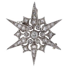 Antique Victorian star burst diamond brooch in silver and 9kt gold