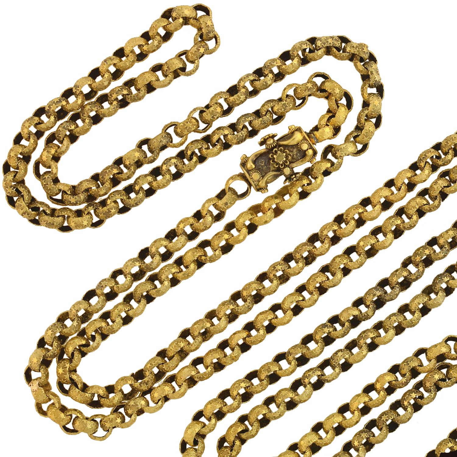 A fabulous link chain from the Victorian (ca1880) era! This beautiful handmade piece is comprised of interlocking 15kt gold links, forming a simple, yet stylish necklace. Each slightly concave link features a textured surface, with two rows of tiny