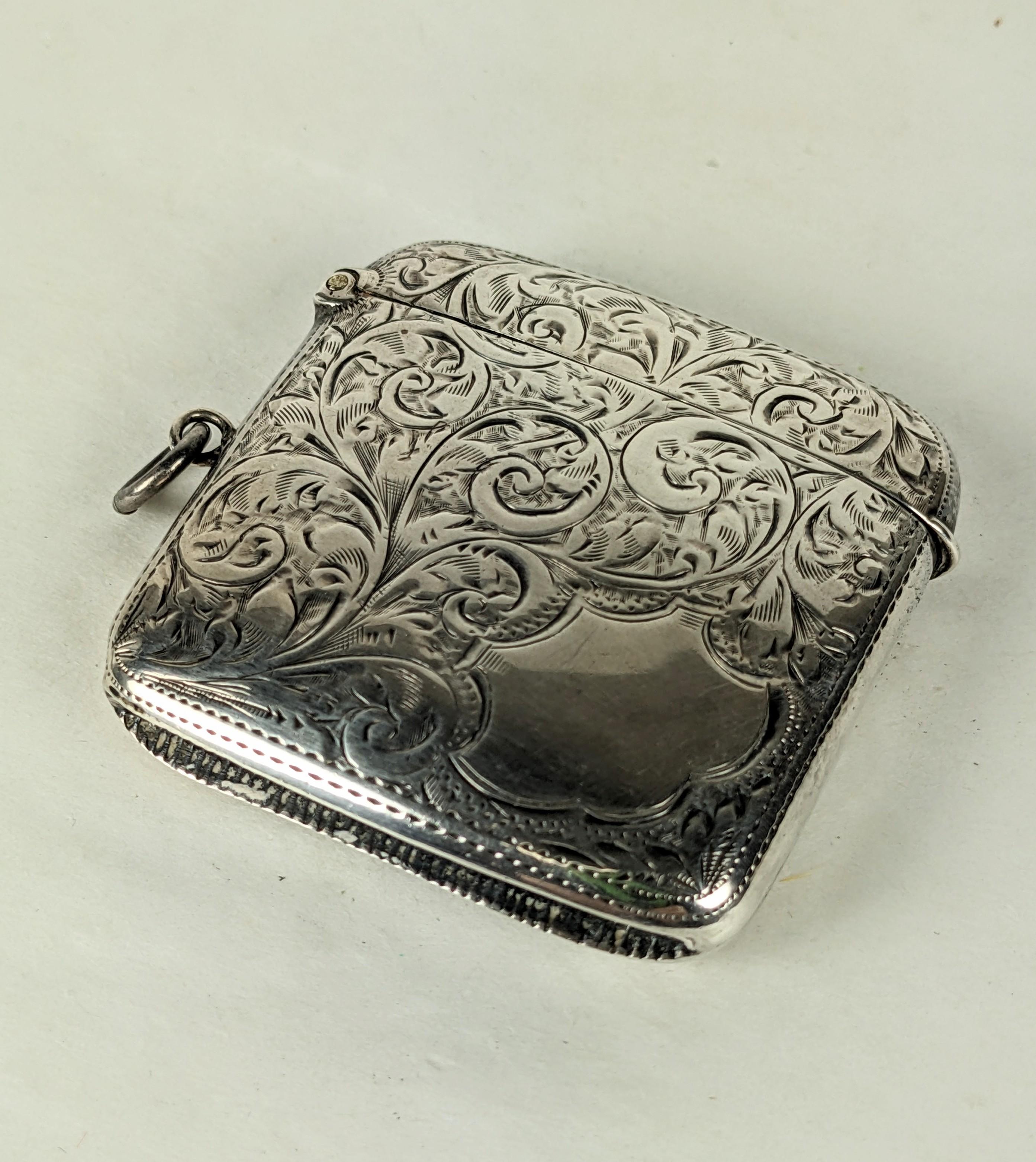 Lovely Victorian Sterling Etched Match safe from the late 1900's UK. Hand etched with ornate scroll patterns with a cartouche which was added for initials. 2