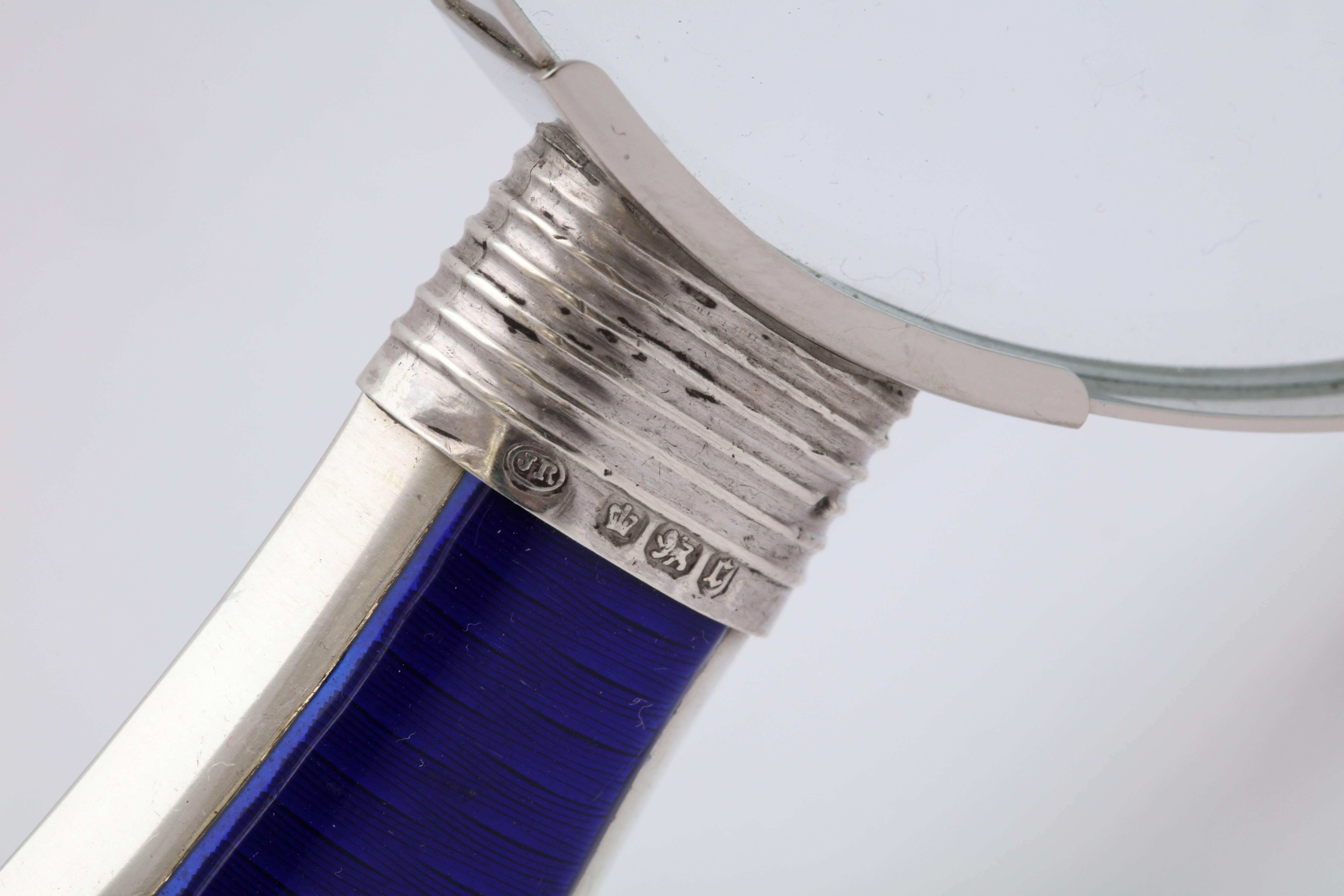 Victorian, sterling silver and deep cobalt blue enamel, mounted magnifying glass, Sheffield, England, 1895, John Round and Sons, Ltd. - makers. Measures: 8 inches long x 3 3/4 inches diameter across glass itself at widest point. Glass is mounted by