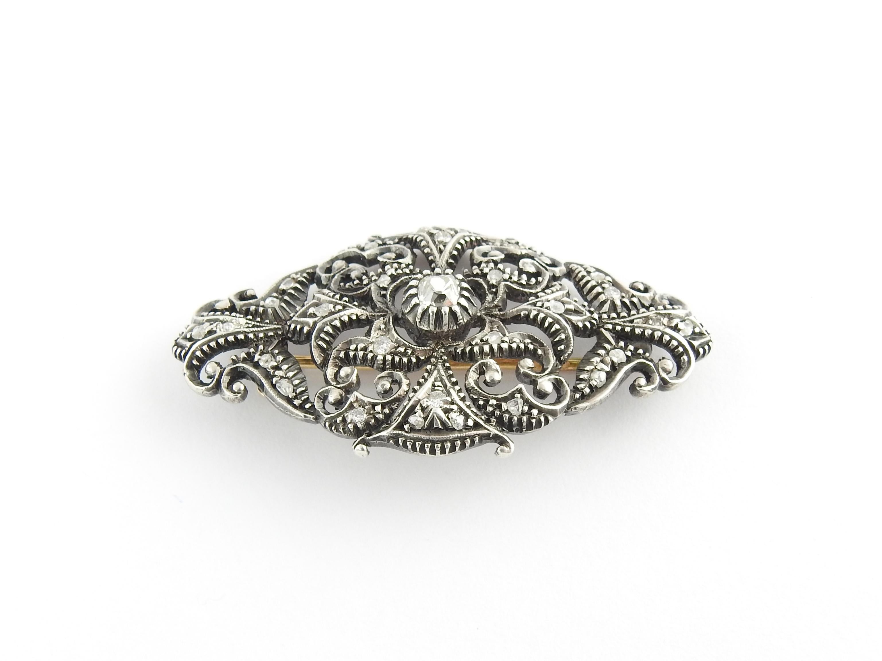 Victorian Sterling Silver and Diamond Brooch Pendant-

This stunning brooch features 29 rose cut and old mine diamonds* set in beautifully detailed sterling silver.  
*Some chips noted to smaller diamonds not visible to naked eye.  
Back of brooch