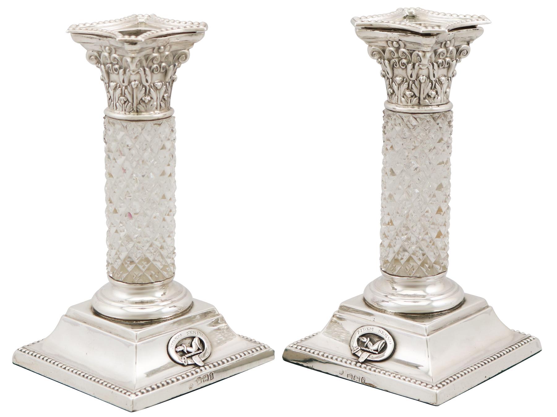 A fine and unusual pair of antique English sterling silver and cut glass candlesticks in the Corinthian style; part of our ornamental silverware collection.

These fine antique Victorian English sterling silver and cut glass candlesticks are