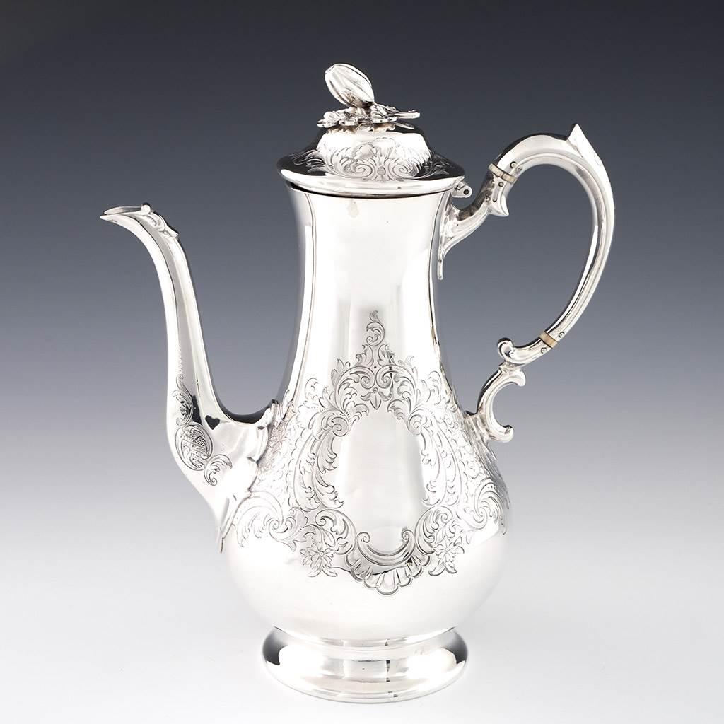 Heading : A Victorian Sterling Silver Coffee Pot London
Date : Hallmarked in London 1864 For D and C Houle
Period : Victoria
Origin : London England
Decoration : Engraved scrolls of acanthus leaves
Size :  Height 27.5cm to top of the