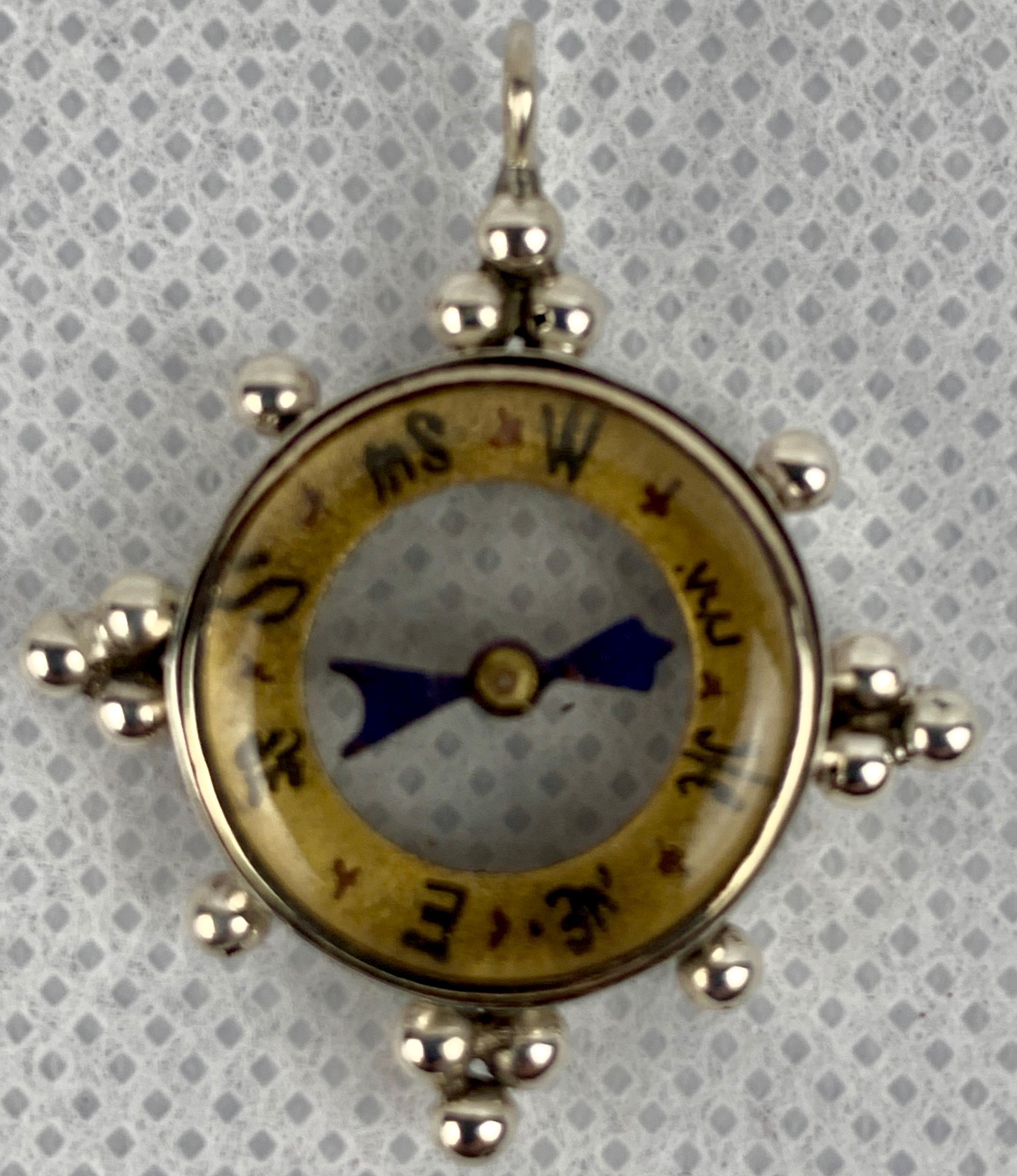 Victorian Albert chain compass fob in sterling silver.  Hallmarked by Pendleton & Sons, Birmingham, England, 1887.  Originally created to grace a gentleman's watch chain, however, today it would work well as a charm on a bracelet or lovely as a