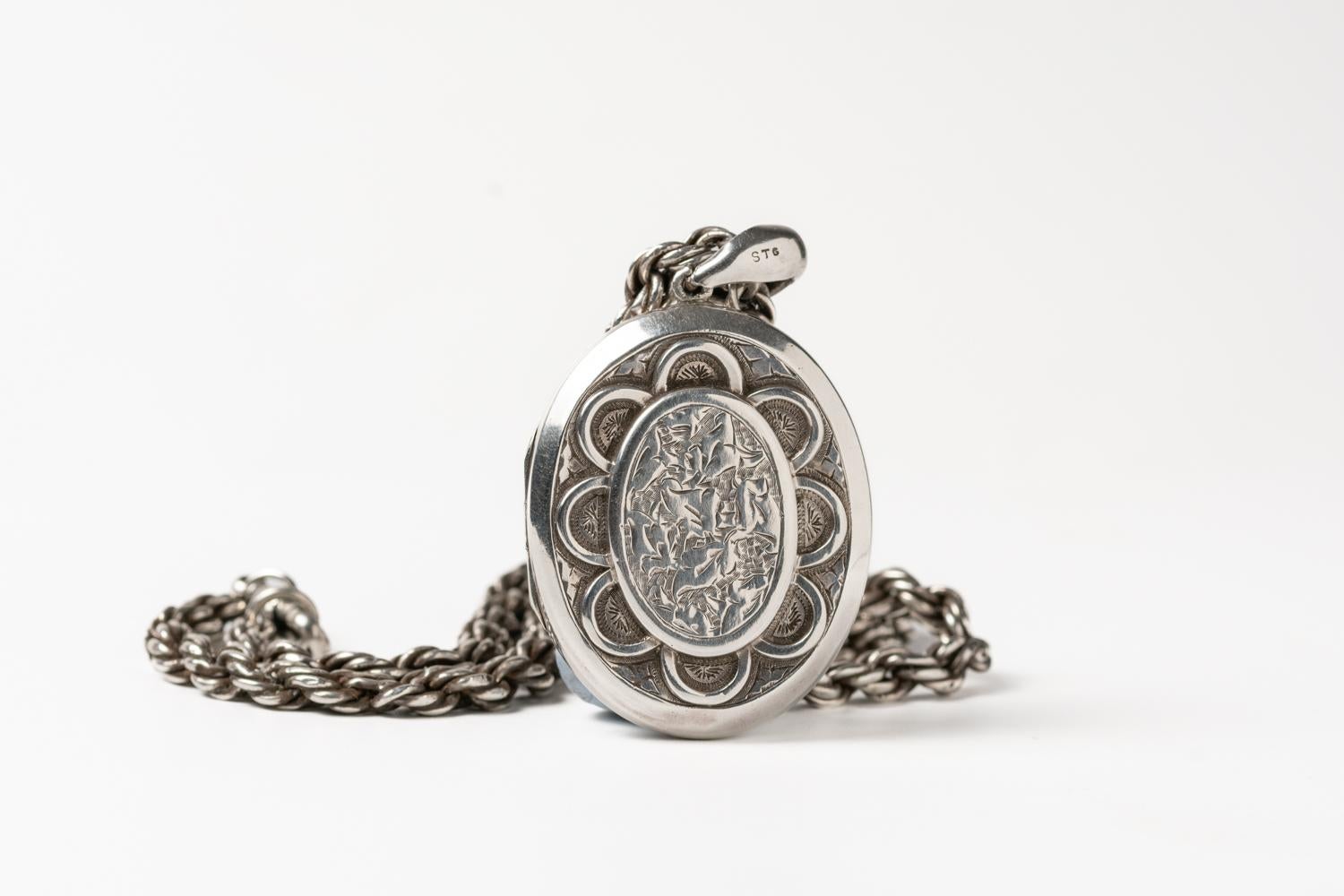 Art Nouveau Victorian Sterling Silver Floral Locket With A Chain For Sale