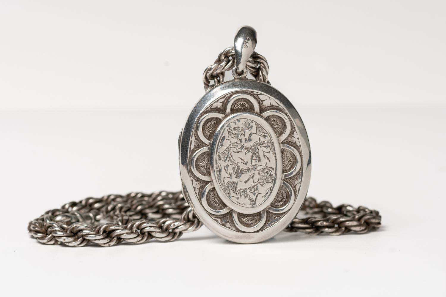 Women's or Men's Victorian Sterling Silver Floral Locket With A Chain For Sale