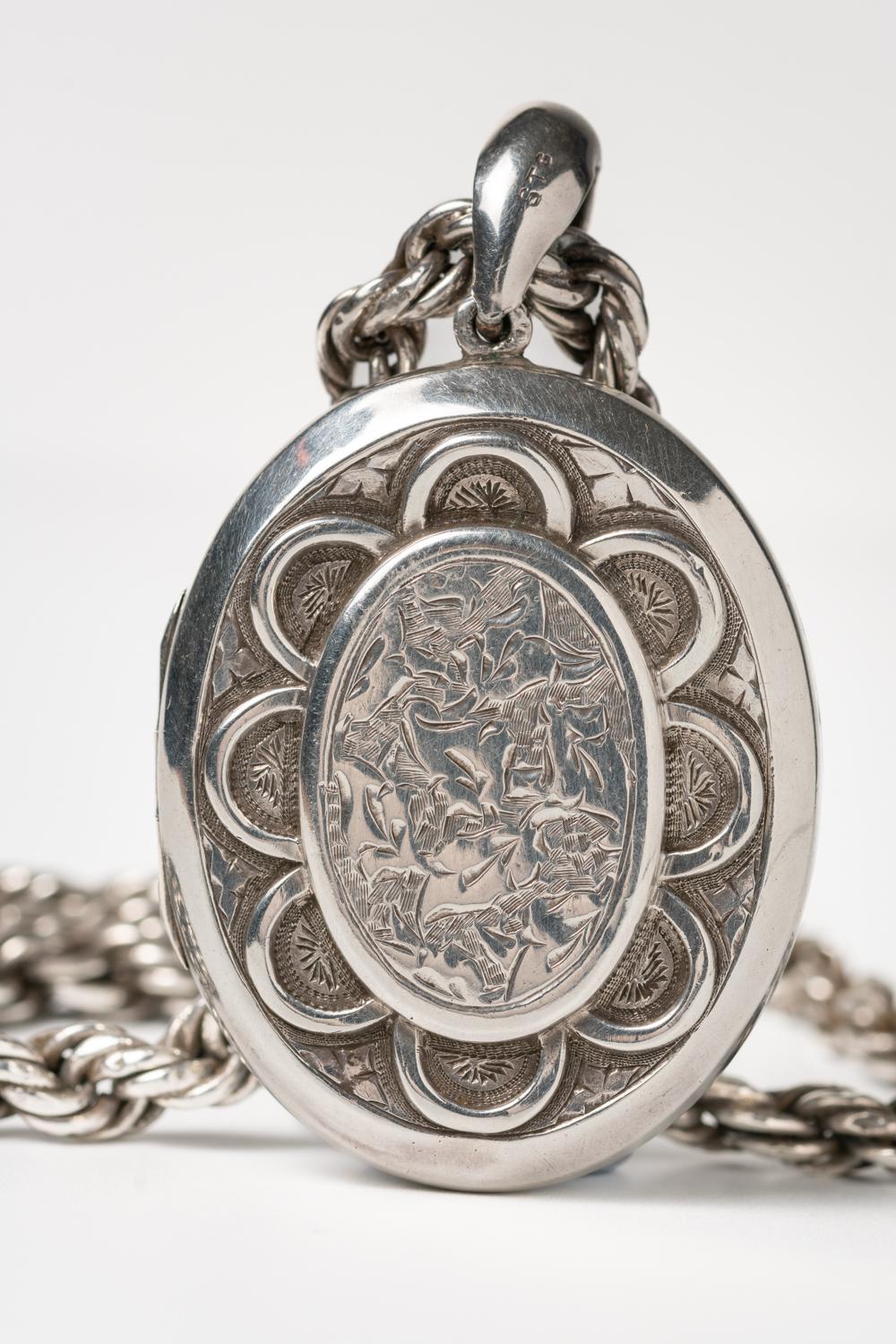 Victorian Sterling Silver Floral Locket With A Chain For Sale 1