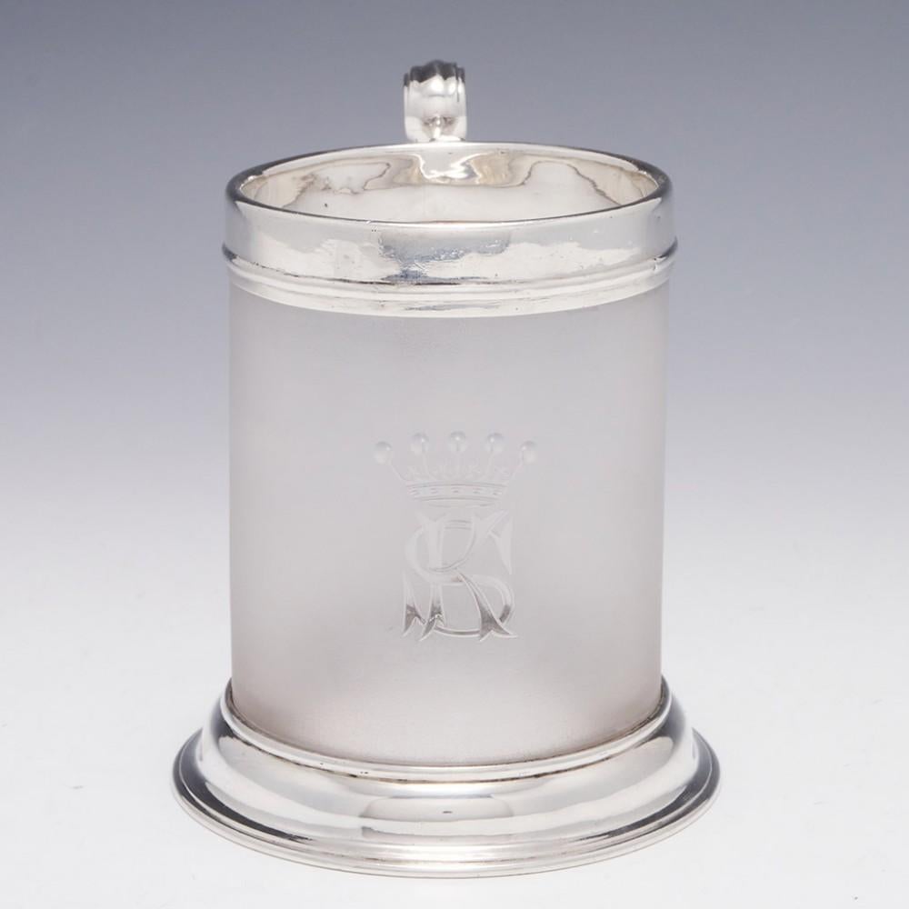 Victorian Sterling Silver and Frosted Glass Twelve Fluid Ounce Tankard London, 1855

Additional information:
Date : Hallmarked in 1855 For John Wilkmin Figg of London
Period : Victoria
Origin : London; England
Decoration : Simple silver rim and