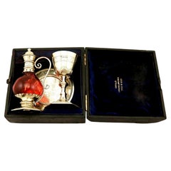Victorian Sterling Silver Gilt and Cranberry Glass Communion Set