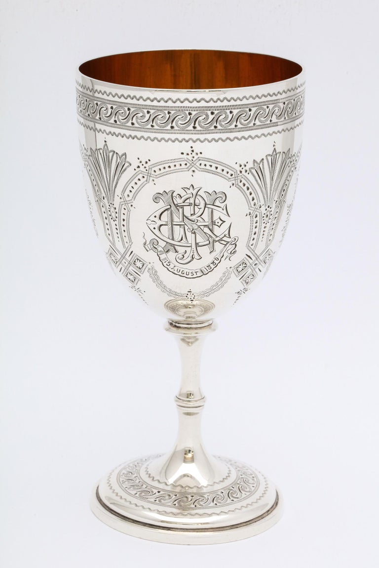 Victorian, sterling silver goblet, London, year-hallmarked for 1873, John Edward, Walter Edward, and John Edward - makers. Measures 5 1/2 inches high x 2 3/4 inches diameter across opening x 2 1/2 inches diameter across base. Gilt interior. Lovely