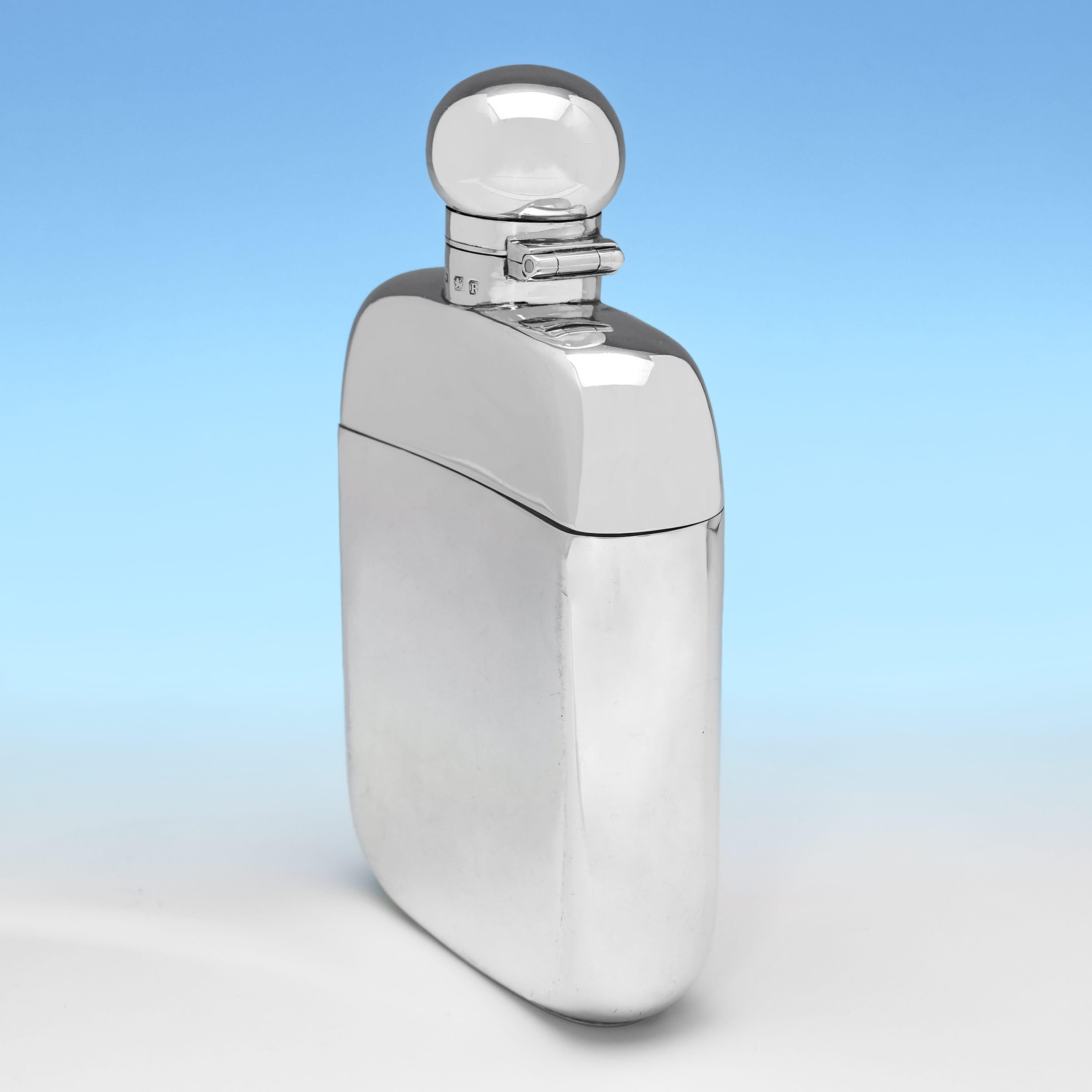 Hallmarked in Chester in 1900 by Edward Osborn Marples, this very handsome, Antique, Victorian Sterling Silver Hip Flask, is plain in design, and features a domed lid bayonet cap, and a larger than usual removable cup. The hip flask measures
