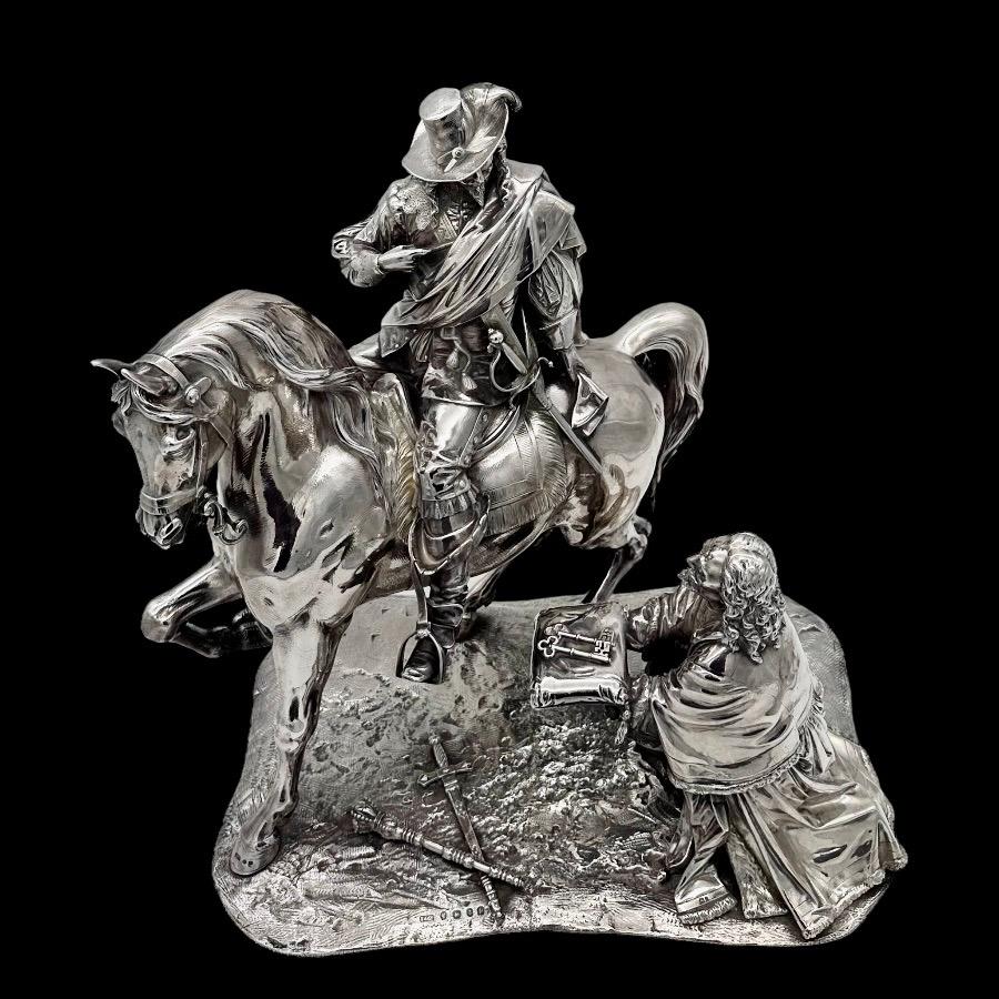 Mid 19th Century Antique Victorian Sterling Silver King Charles Ist Ornamentation Birmingham 1864 Elkington & Co 

Fabulous and extremely rare large sterling silver historical sculpture depicting King Charles I on horse back receiving the keys to