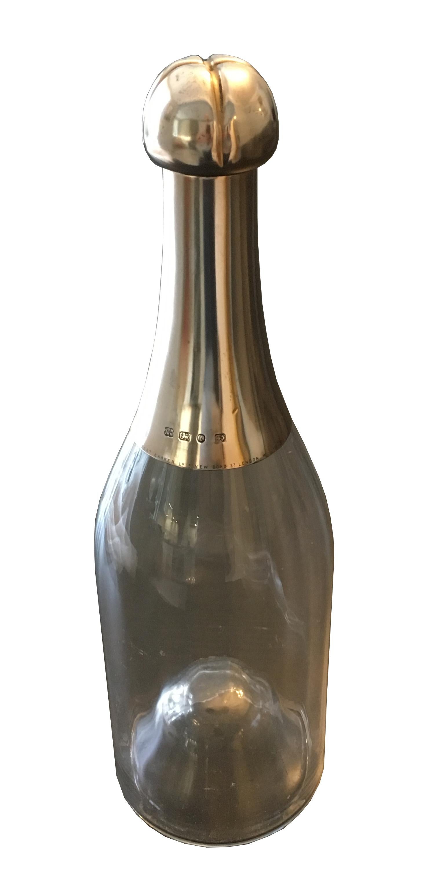 A stunning and rare sterling silver mounted magnum champagne and wine decanter.

Made by Heath and Middleton and hallmarked for Birmingham 1893.

The removable silver 