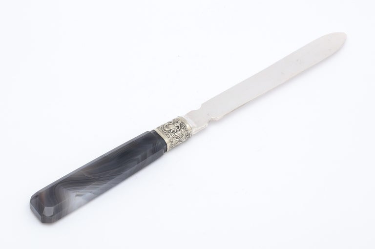 Victorian Period, sterling silver-mounted dark gray agate letter opener/paper knife, Sheffield, England, year-hallmarked for 1900, Mappin and Webb - makers. Measures 8 1/2 inches long x 1 3/4 inches wide (at widest point) x 1/2 inch high when lying